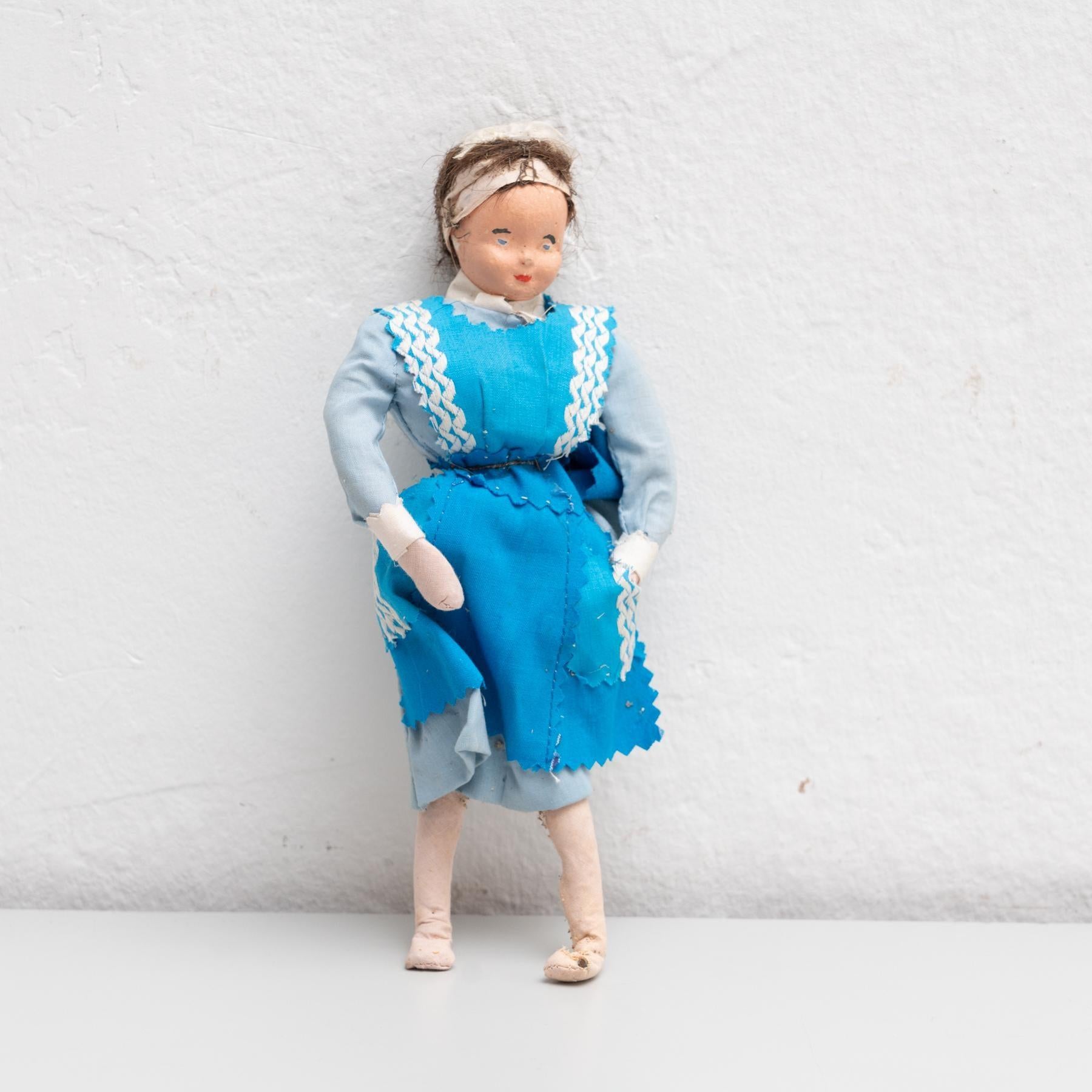 Antique early 20th century hand painted traditional Spanish rag doll dressed with traditional maid costume.     Manufactured circa 1920 in Spain.    In original condition, with minor wear consistent with age and use, preserving a beautiful patina.  