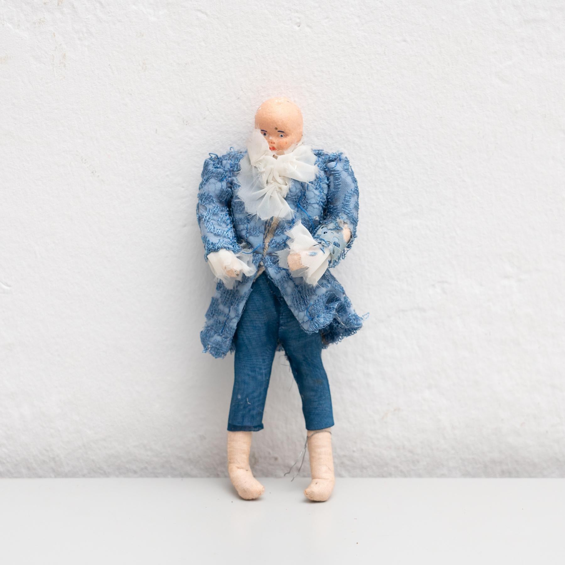 Antique early 20th century hand painte Spanish rag doll with traditional costume.     Manufactured circa 1920 in Spain.    In original condition, with minor wear consistent with age and use, preserving a beautiful patina.    Materials:  Fabric. 