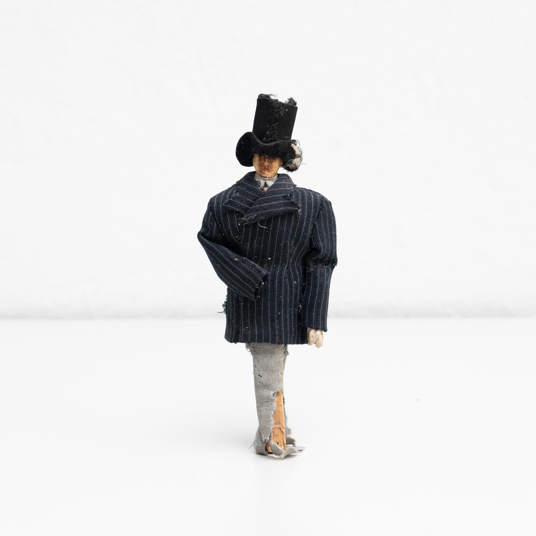 Antique early 20th century hand painted rag doll of man wearing a top hat. 

Manufactured circa 1920 in Spain.

In original condition, with minor wear consistent with age and use, preserving a beautiful