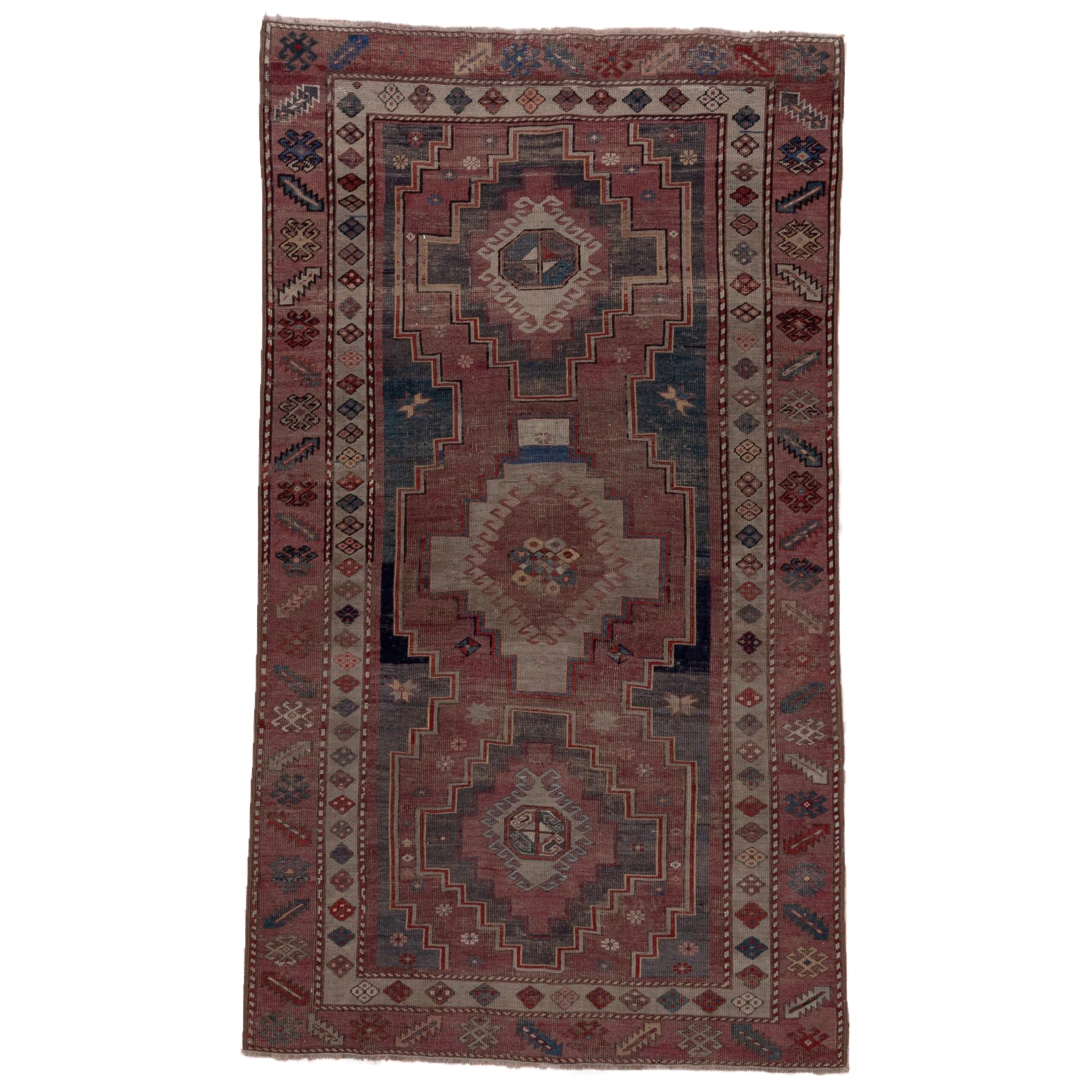 Antique Transcaucasian Rug, Colorful Palette, Purple Borders, Multicolored Field For Sale