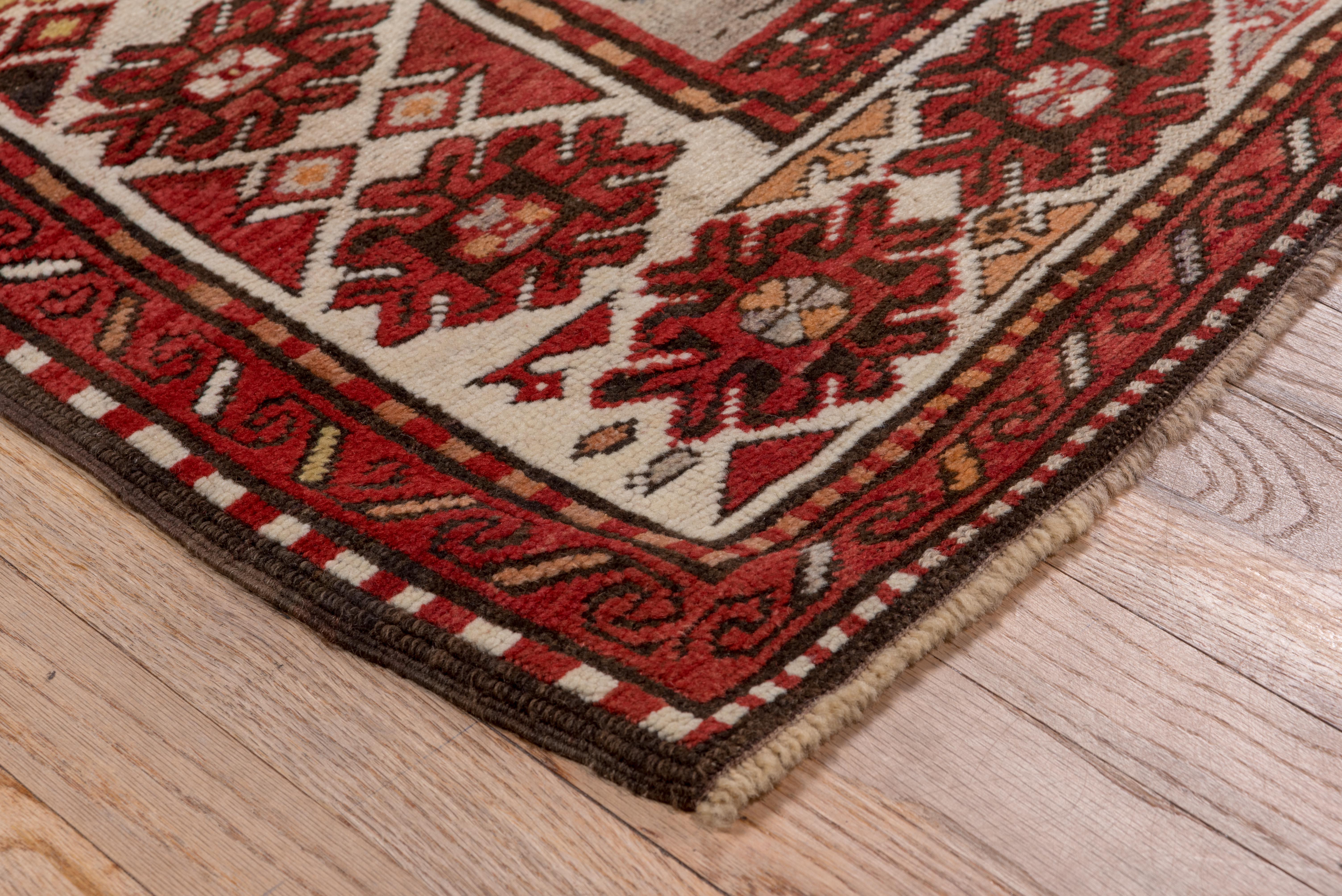 Wool Antique Transcaucasian Rug Shield Medallion Pattern For Sale