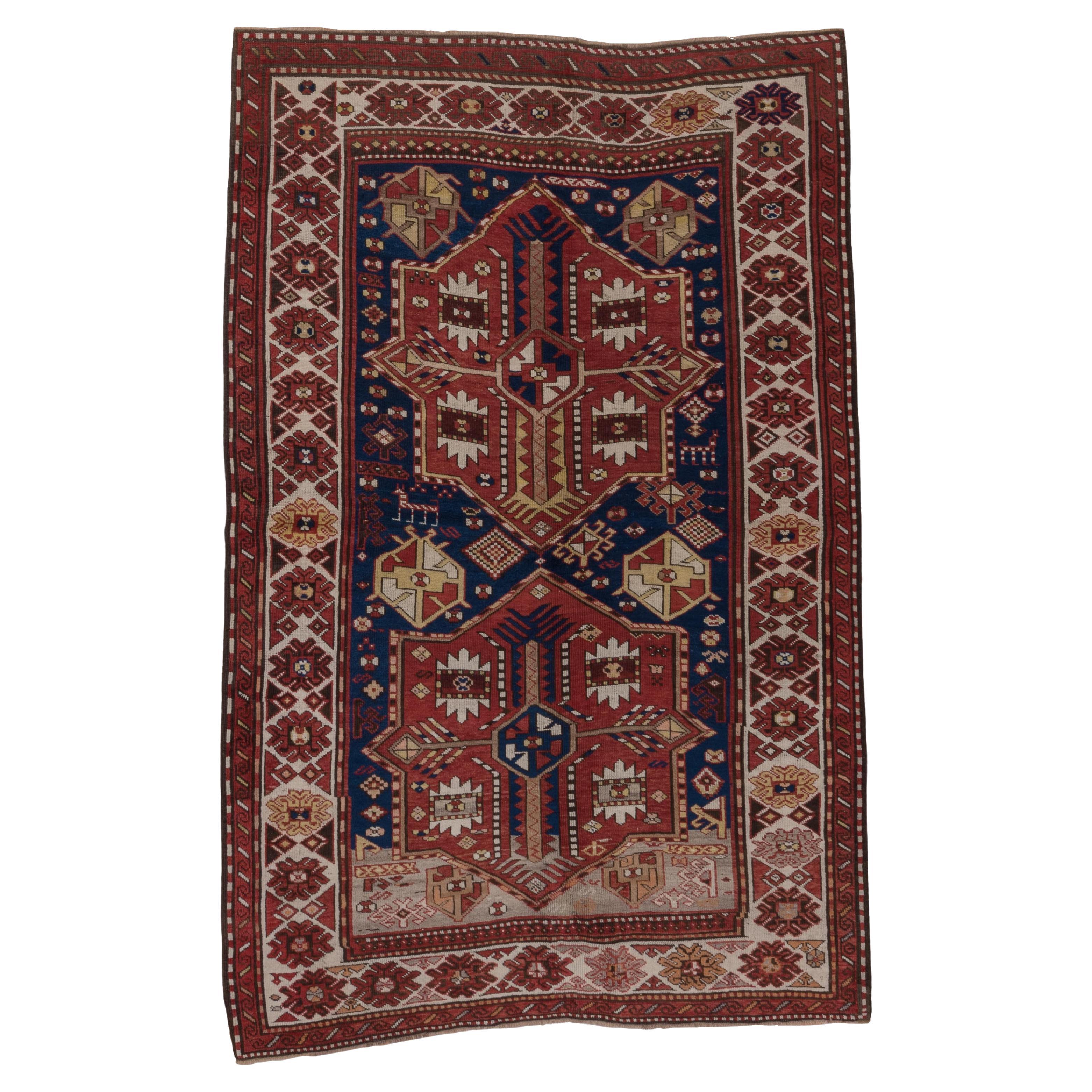 Antique Transcaucasian Rug Shield Medallion Pattern For Sale