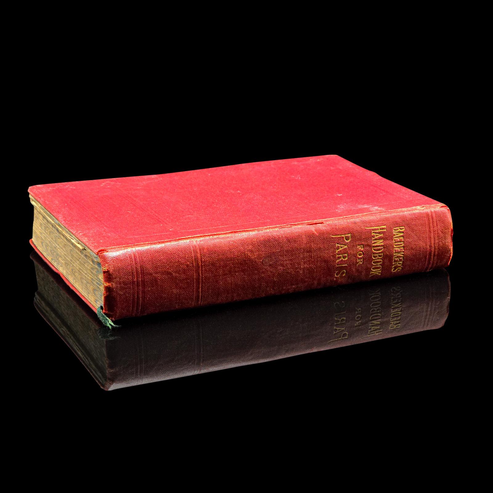 This is an antique copy of Baedeker’s Paris and its Environs, a bound and illustrated travel guide book, presented in its intact, original order with only light markings. A superb example of Baedeker’s renowned guides; admired for their clarity,