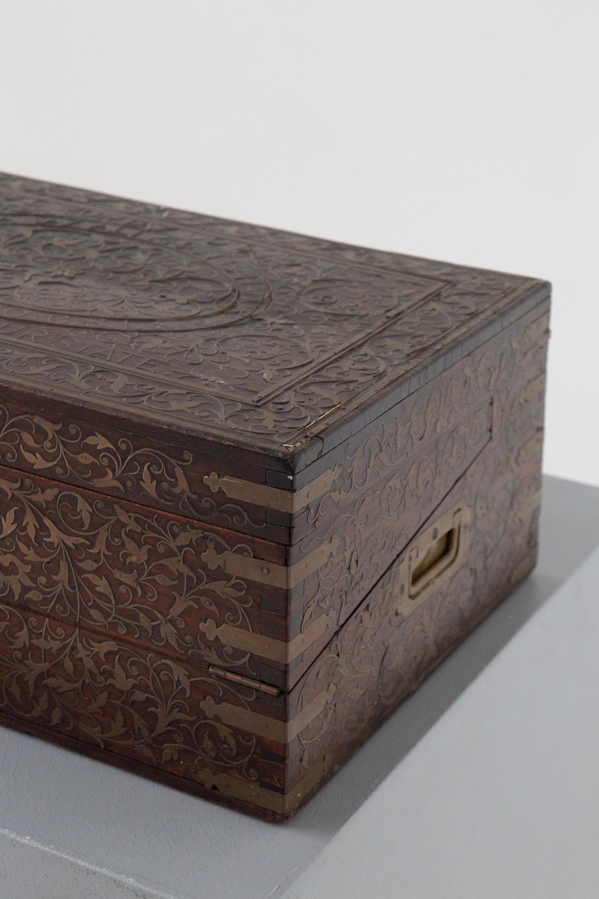 Here is the breathtaking masterpiece that is this small brass inlaid wooden travel desk, adorned with rich leaf motifs that intertwine stories of history and art. This remarkable piece was once bestowed upon the esteemed Minister of State of Jaipur,
