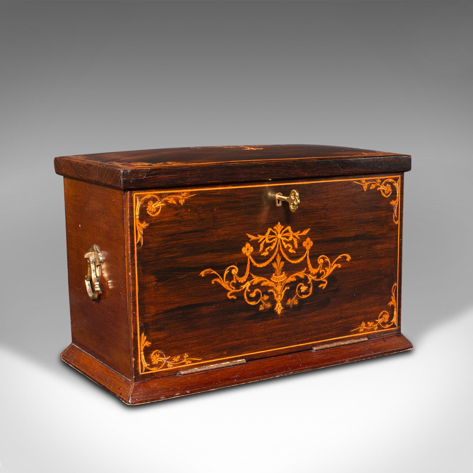 This is an antique travelling author’s writing box. An English, flame mahogany and boxwood correspondence case, dating to the late Victorian period, circa 1880.

Striking Victorian craftsmanship with delightful marquetry
Displays a desirable aged