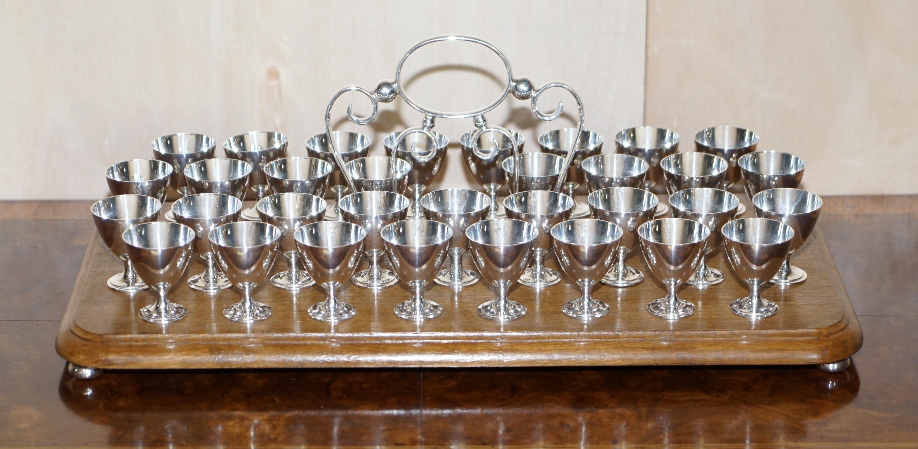 We are delighted to offer for sale this lovely antique tray with 37 EPNS shot cups originally designed as a communion tray

A good looking well made and decorative suite, used in party’s up and down as cool shot trays, a far cry from the original