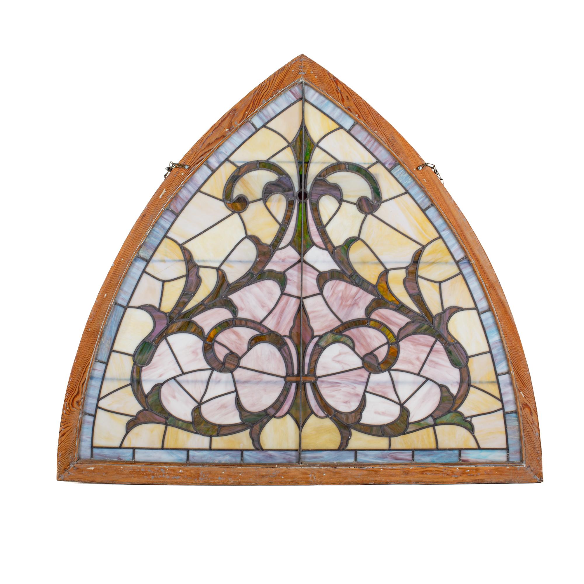 Antique Triangular Stained Glass Window

This window measures: 64 wide x 2.75 deep x 55 inches high

This window is in Great Vintage Condition with minor marks, dents, and wear.

We take our photos in a controlled lighting studio to show as