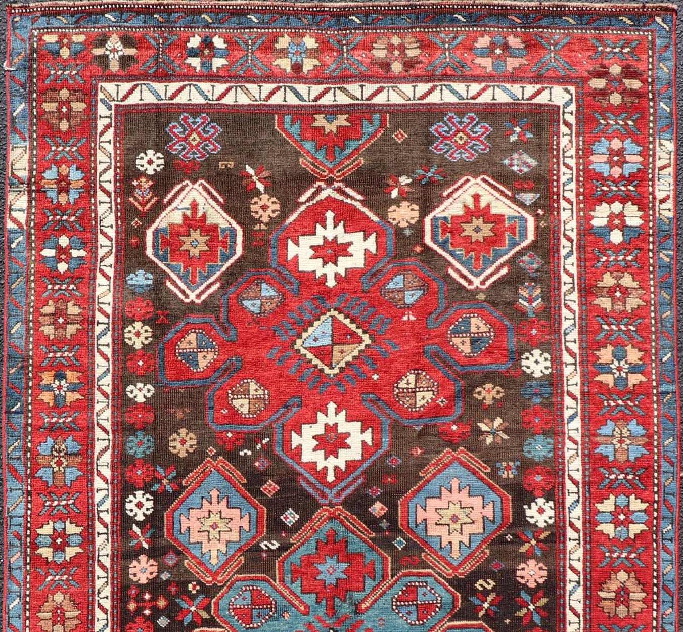Antique Tribal Caucasian Kazak Rug in Brown and Red with Geometric Design. Keivan Woven Arts rug EMB-22141-15044, country of origin / type: Caucuses / Caucasian Kazak, circa 1890.
Measures: 4'0 x 7'5 
Brilliant Kazak rugs are among the most