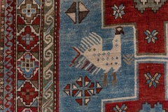 Antique Tribal Caucasian Rug, Blue and Red Field, Green Accents, Kazak Style