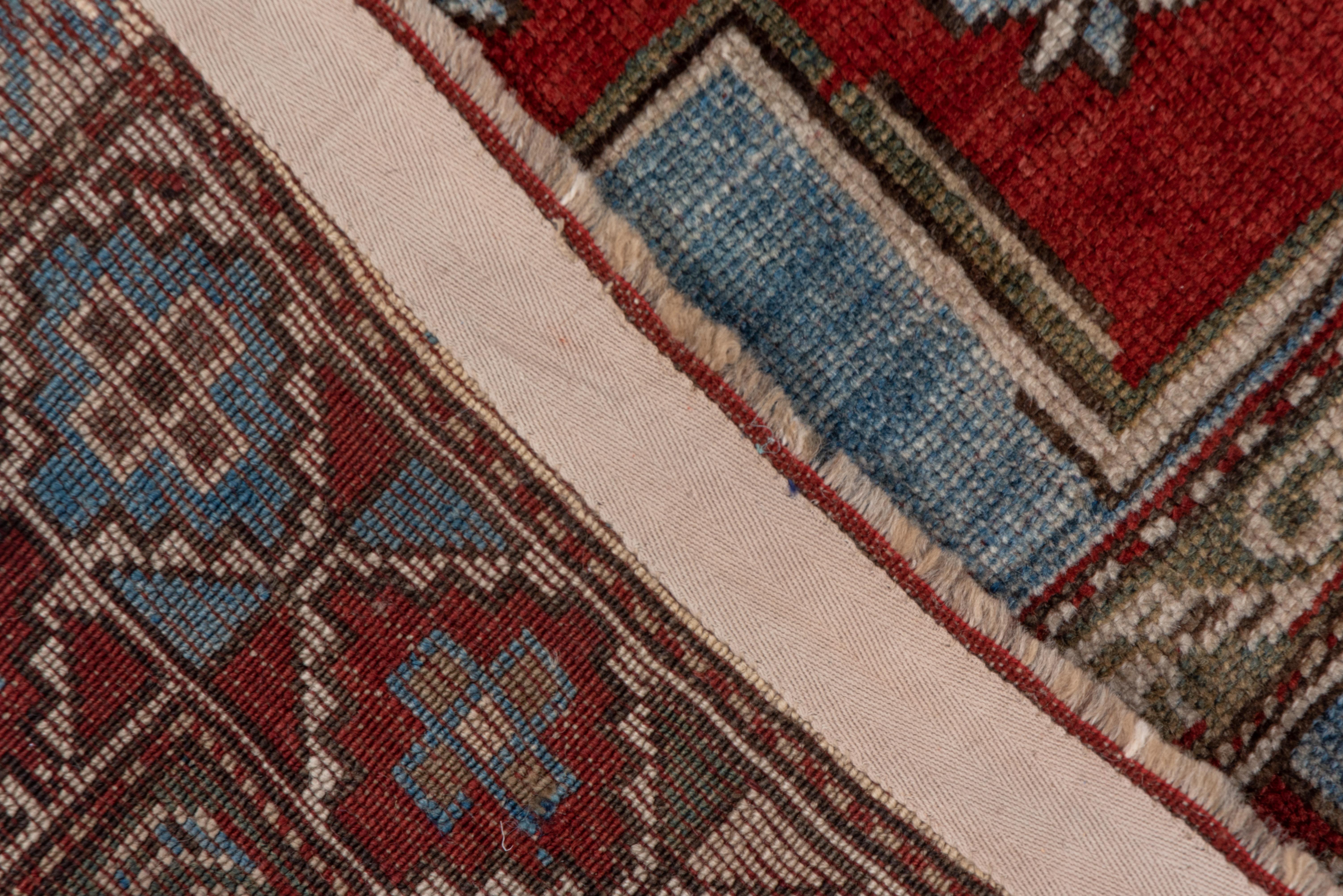 Hand-Knotted Antique Tribal Caucasian Rug, Blue and Red Field, Green Accents, Kazak Style
