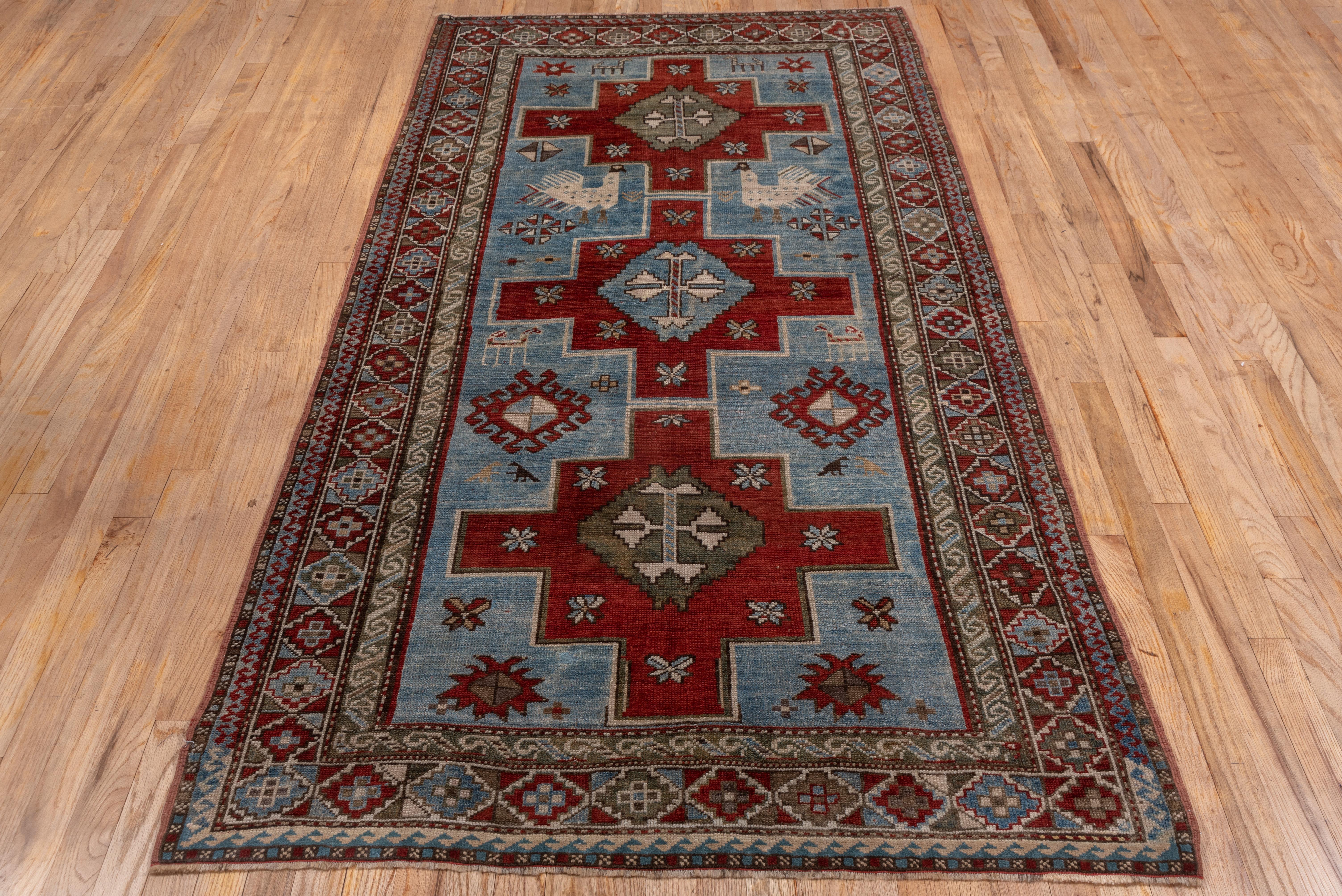 Early 20th Century Antique Tribal Caucasian Rug, Blue and Red Field, Green Accents, Kazak Style