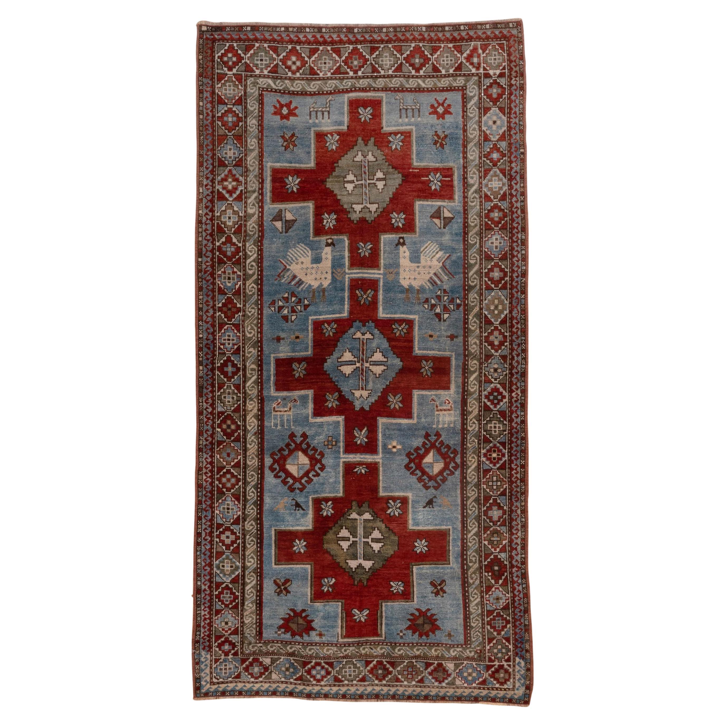 Antique Tribal Caucasian Rug, Blue and Red Field, Green Accents, Kazak Style