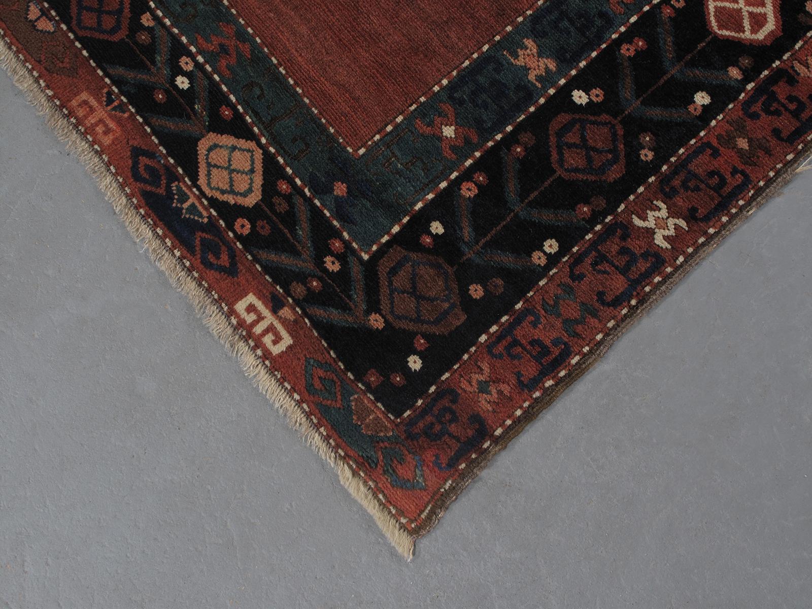 Hand-Knotted Antique Tribal Caucasian Rug with Medallions