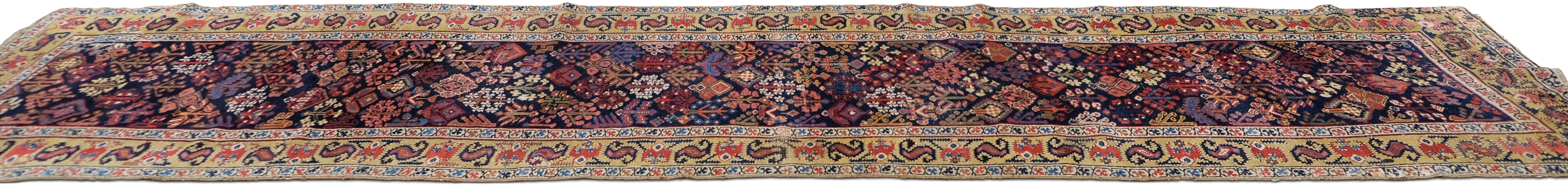 Annodato a mano Antico runner tribale caucasico in lana dai colori vivaci 3'4''x13'8'' in vendita