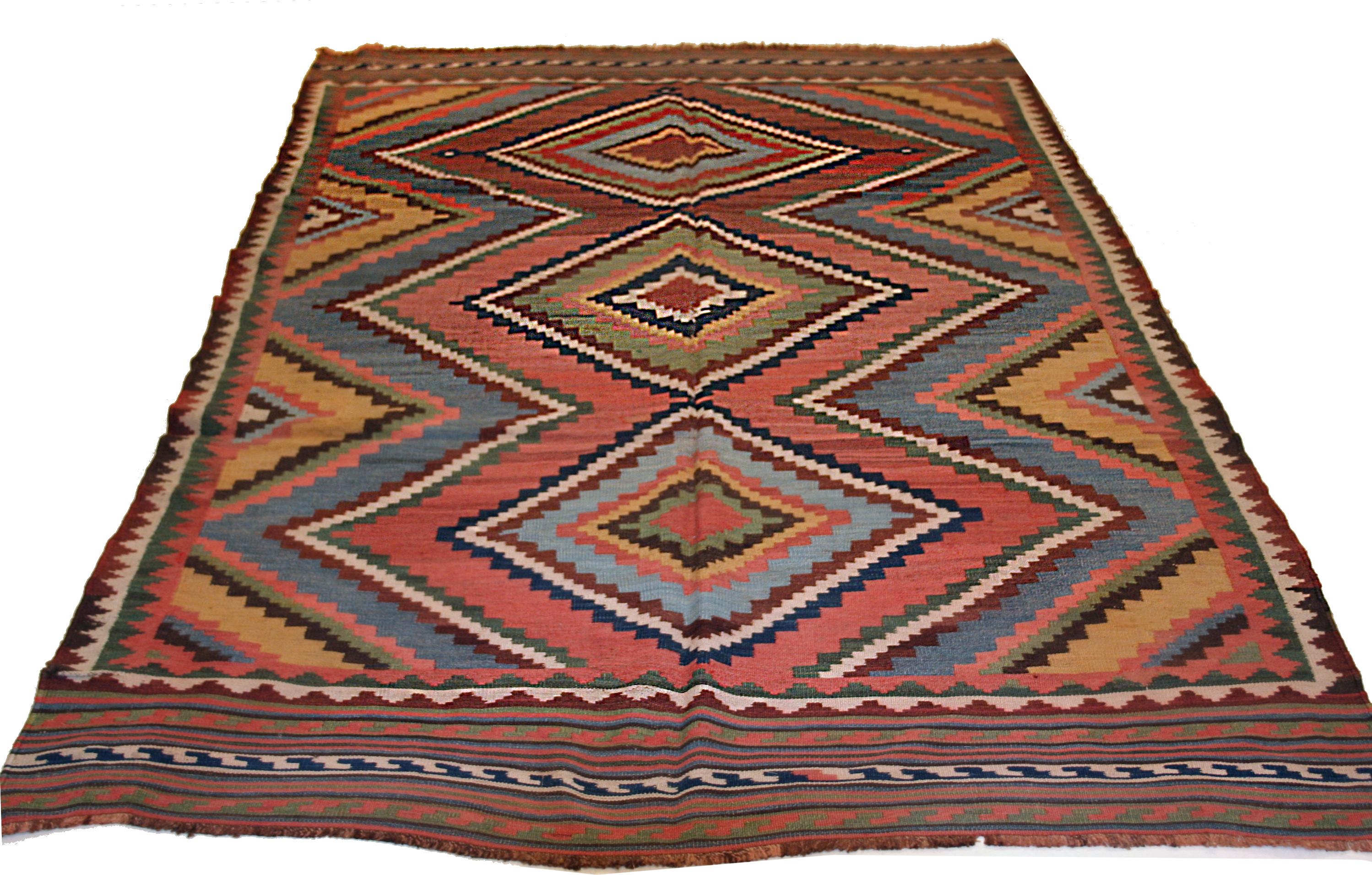 A stunning antique Kilim distinguished by parallel and offset rows of concentric, polychrome diamonds laid over a light blue background. Kilims of this type, exhibiting a full range of natural dyes, are extremely difficult to come by, especially in