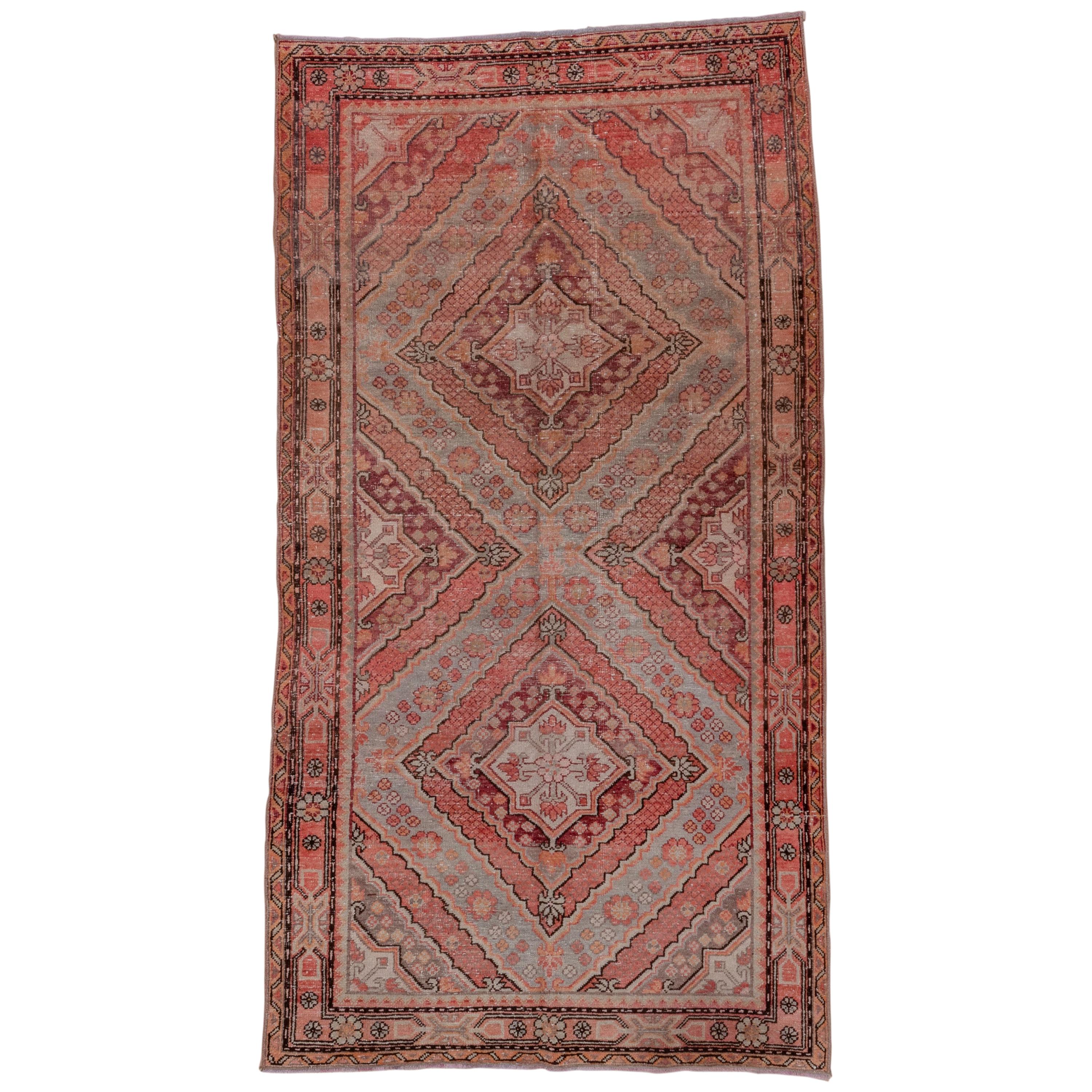 Antique Tribal Khotan Rug, Pink Red Orange and Light Blue Palette Unusual Design For Sale