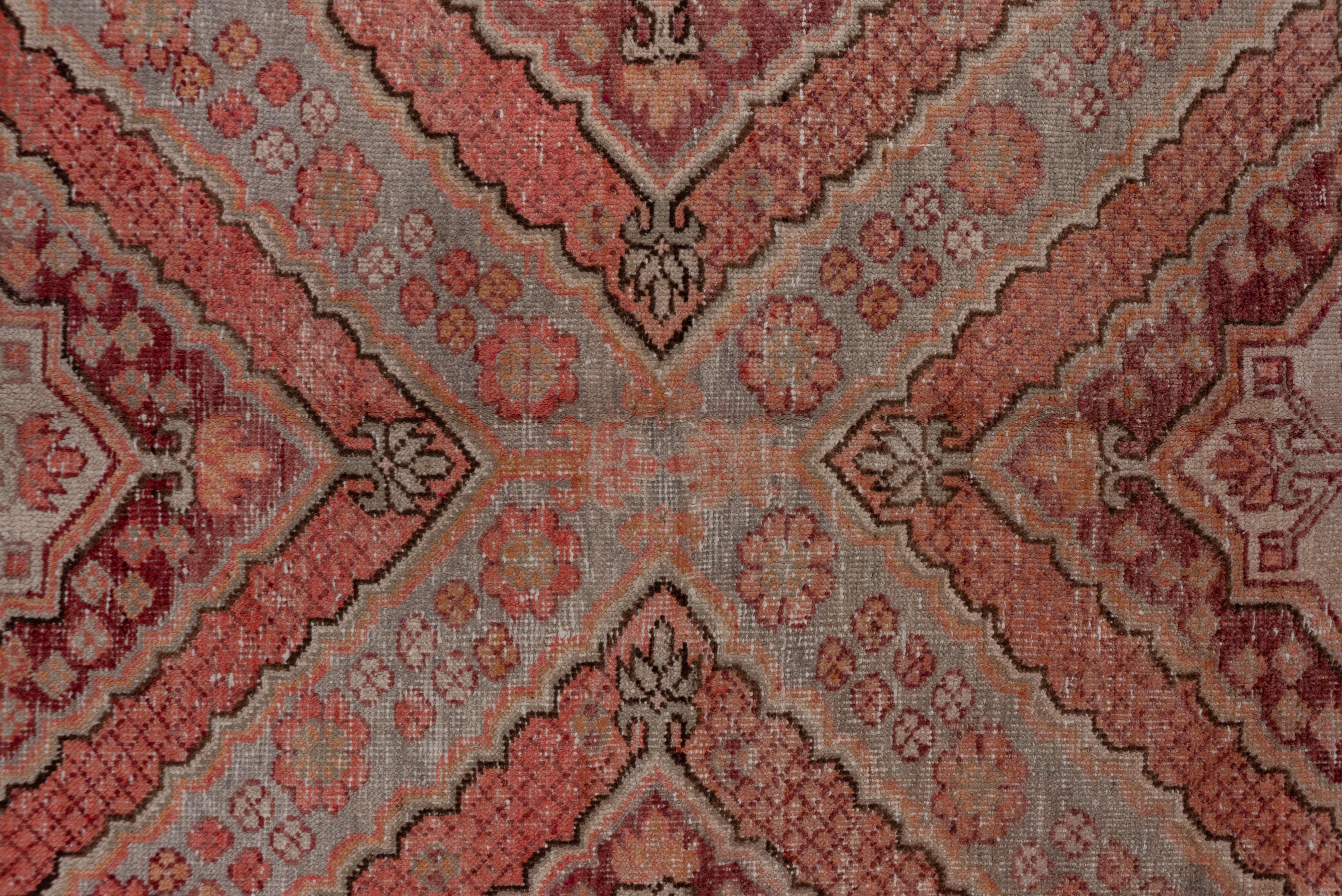 Antique Tribal Khotan Rug, Pink Red Orange and Light Blue Palette Unusual Design In Good Condition For Sale In New York, NY