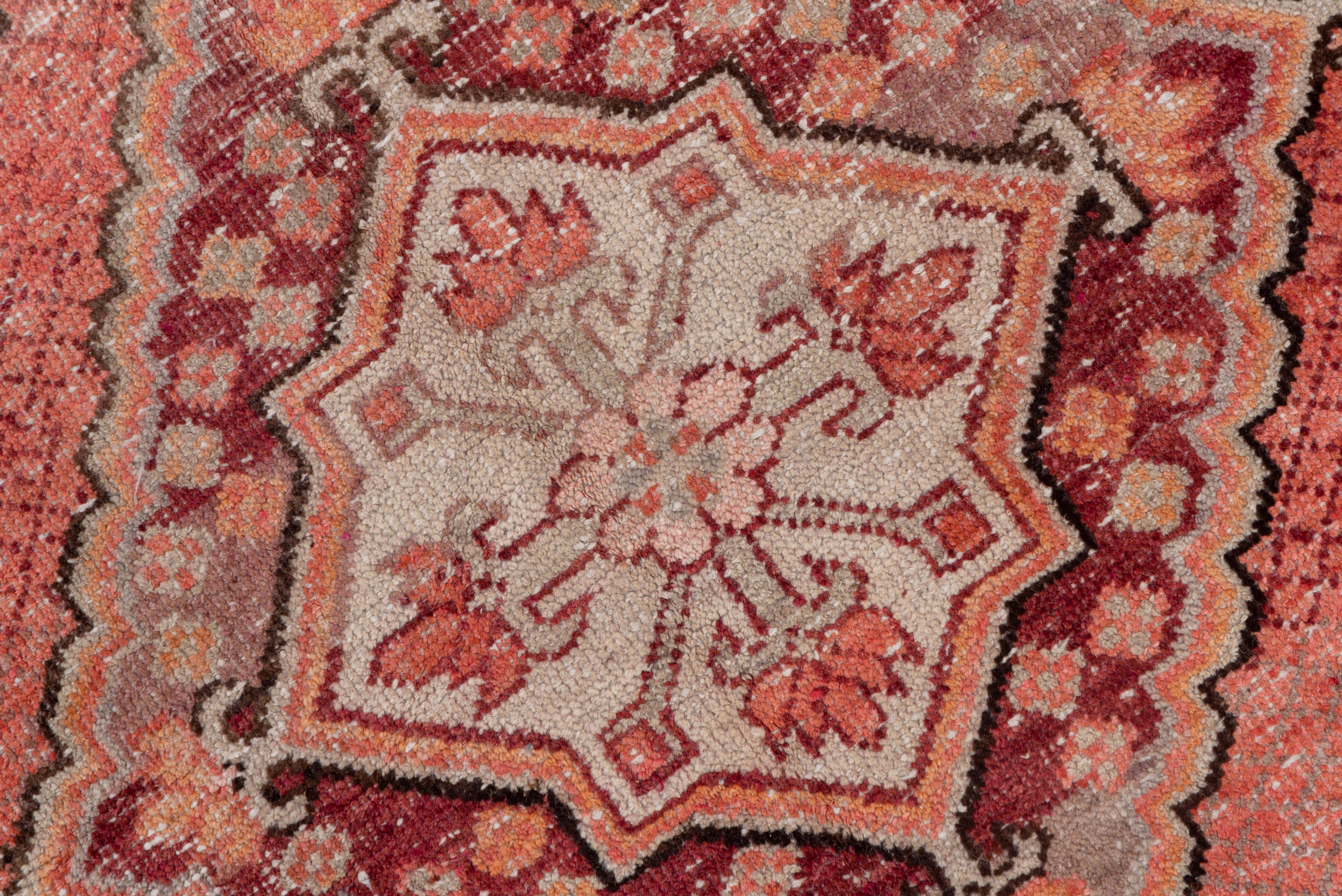 Early 20th Century Antique Tribal Khotan Rug, Pink Red Orange and Light Blue Palette Unusual Design For Sale