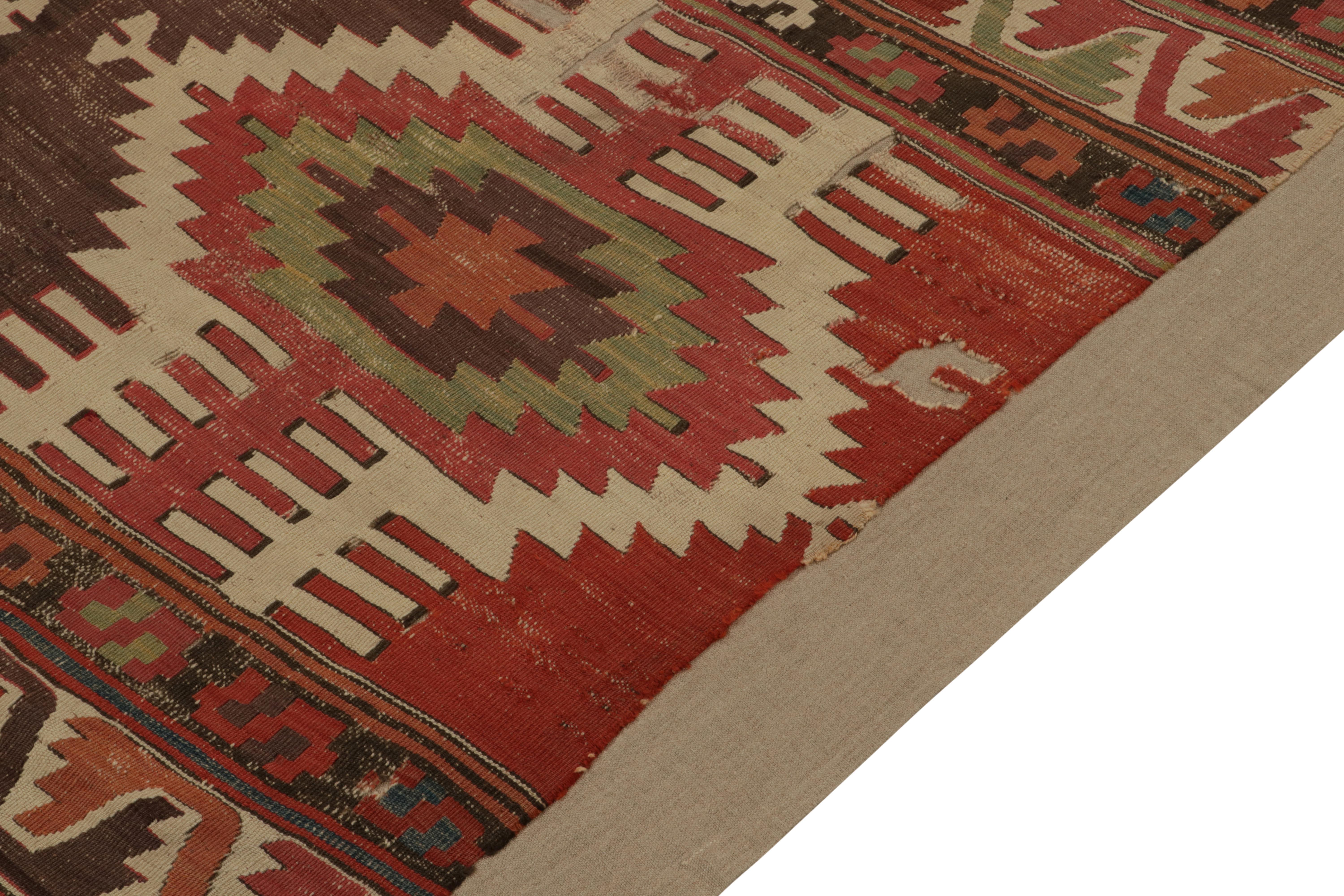 Hand-Woven Antique Tribal Kilim rug in Red, Beige-Brown Geometric Pattern by Rug & Kilim For Sale