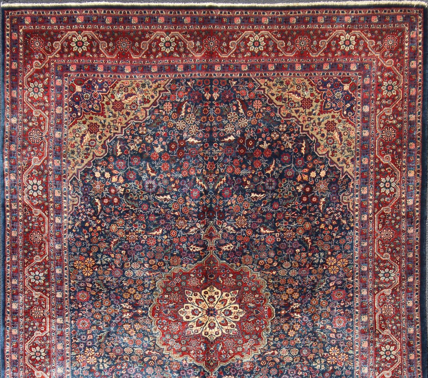 Blossoming antique Persian Josan rug with all-over Arabesque design in blue, rug EB-CON-10001, country of origin / type: Iran / Josan, circa. 1900

Distinct colors that are similar yet starkly rendered flow alongside each other in this gorgeous