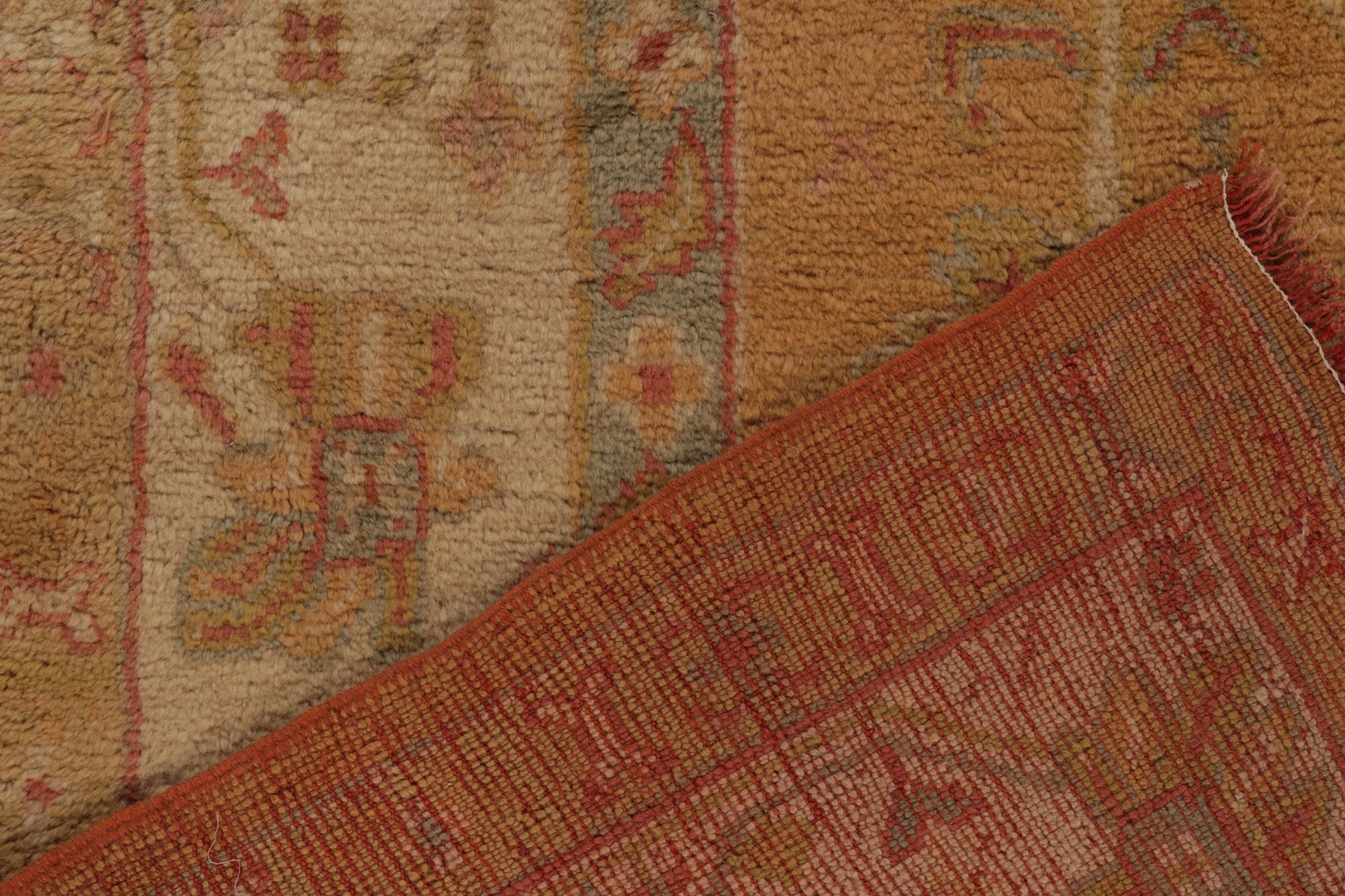Wool Antique Tribal Oushak Rug in Gold, Pink Floral Medallion Pattern by Rug & Kilim For Sale