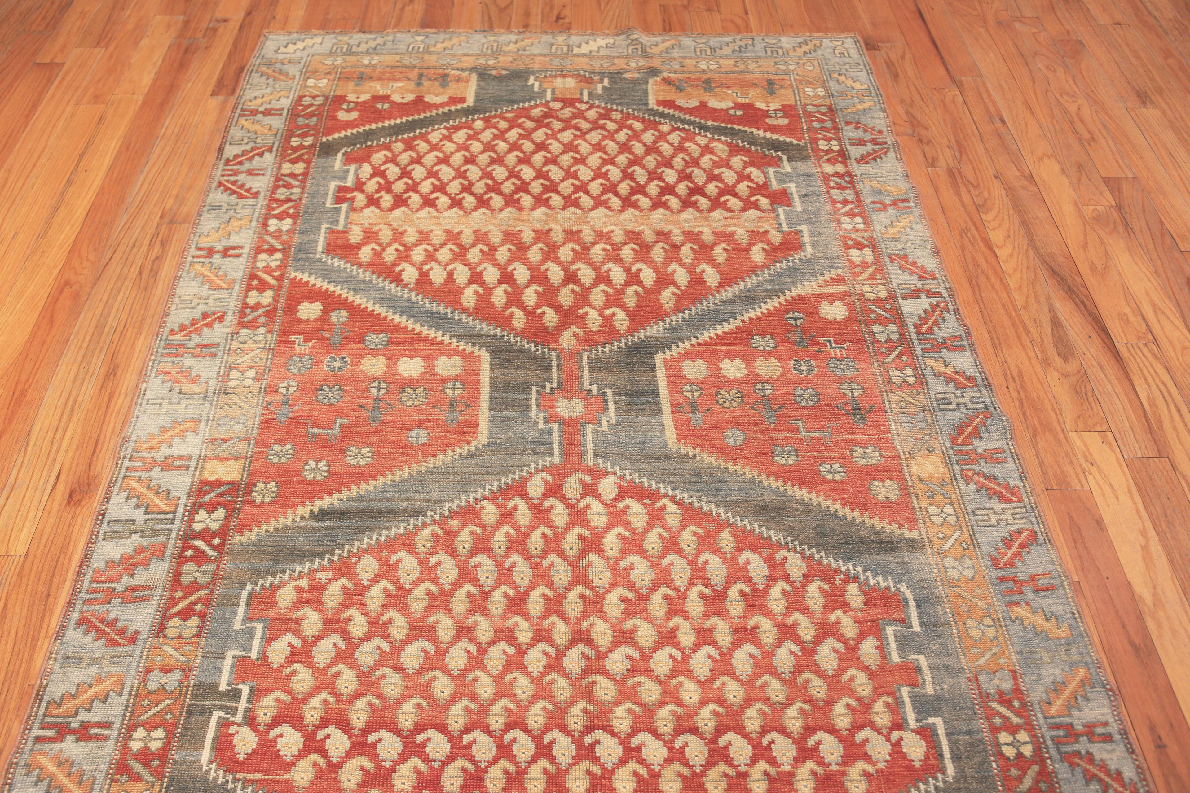 Rustic Antique Tribal Paisley North West Persian Gallery Size Abrash Rug, Country of Origin: Persia, Circa date: 1920. Size: 5 ft 4 in x 17 ft (1.63 m x 5.18 m)

