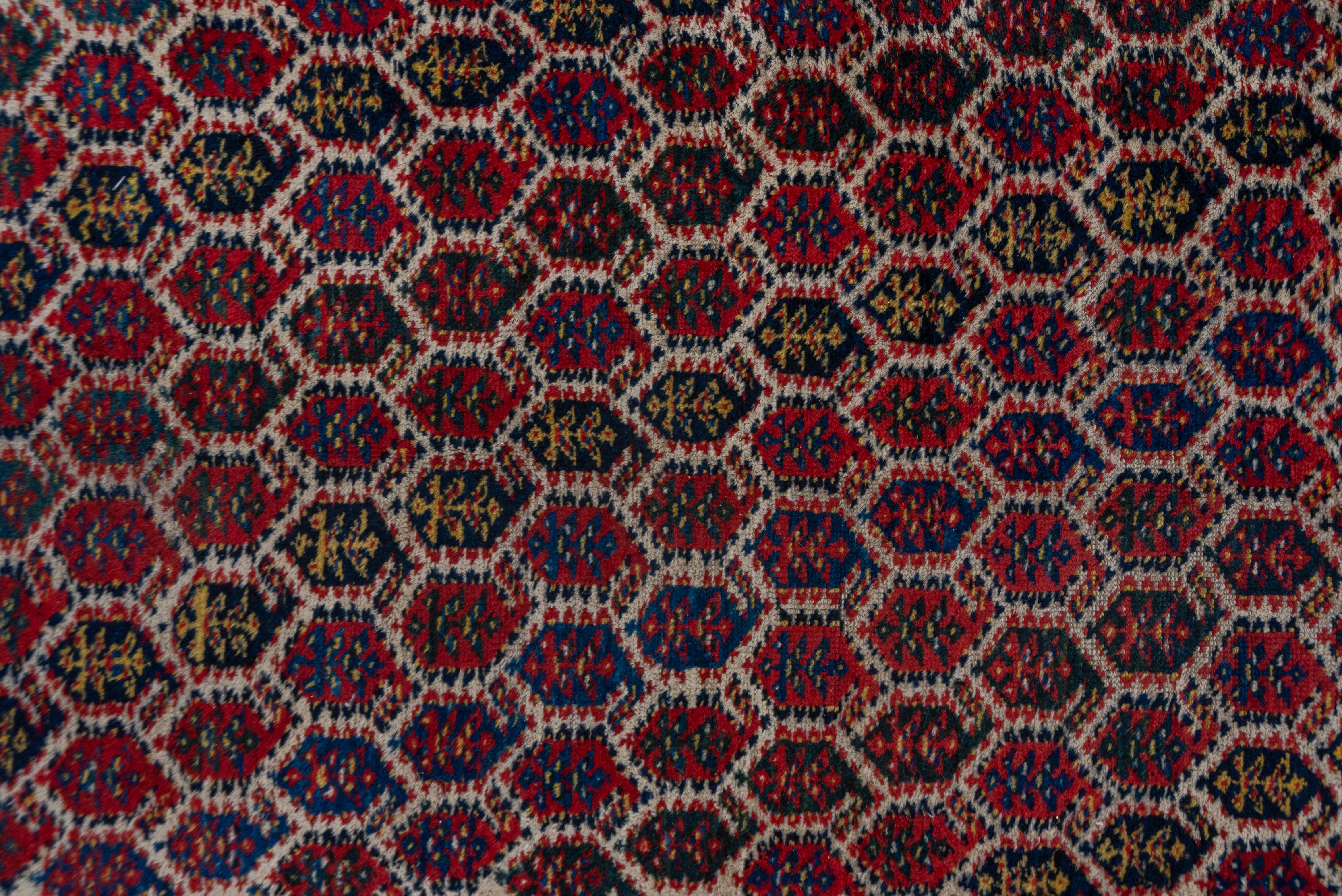 Hand-Knotted Antique Tribal Persian Kurd Runner, circa 1900s, All-Over Field, Medium Pile For Sale