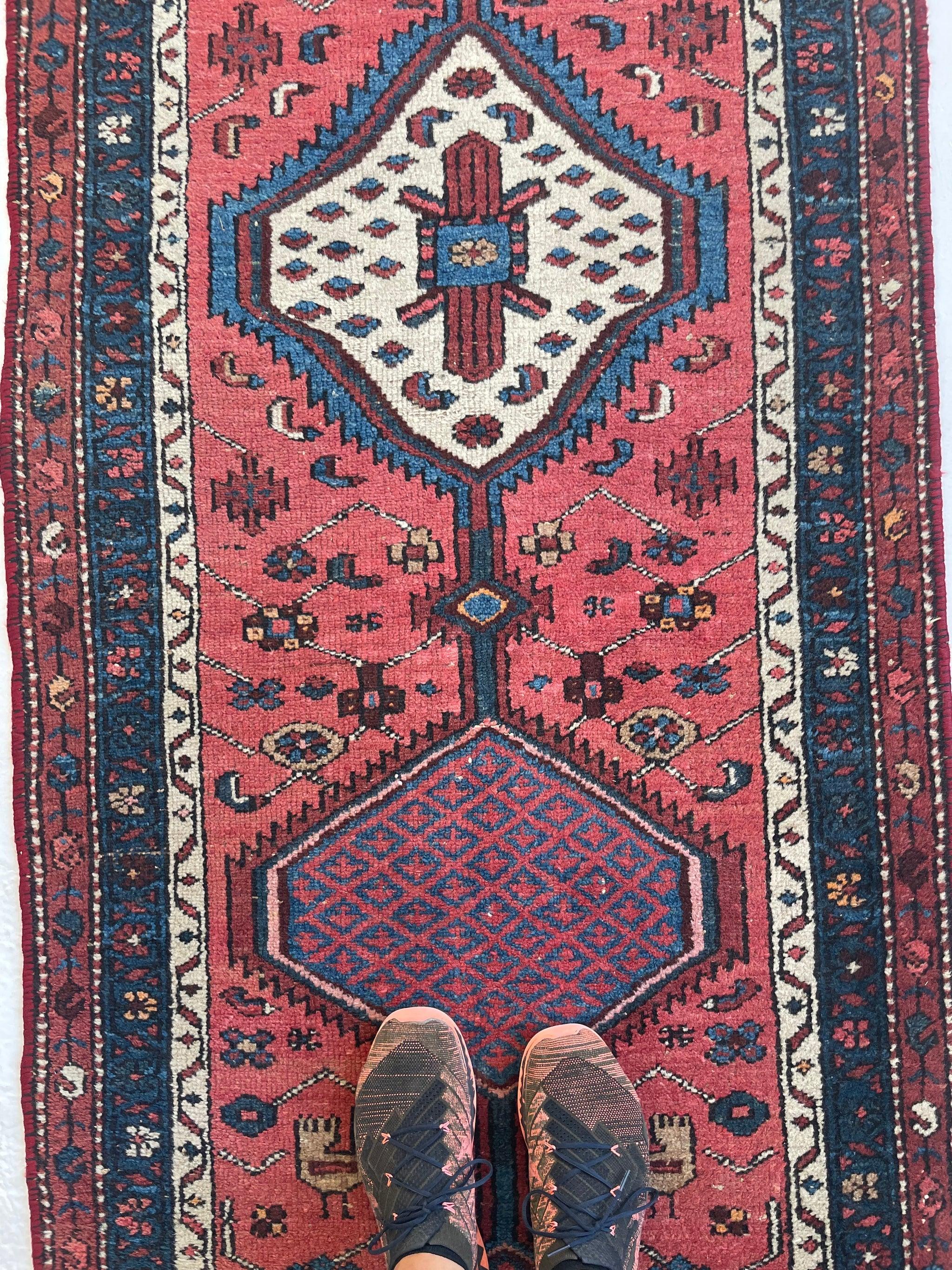 Charming Village Runner antique tribal with watermelon & midnight blue 

About: One of the most attractive and optimistic runners we have! Watermelon, with midnight blue and camel!! In my opinion, one of the beset tri-color combinations, and the