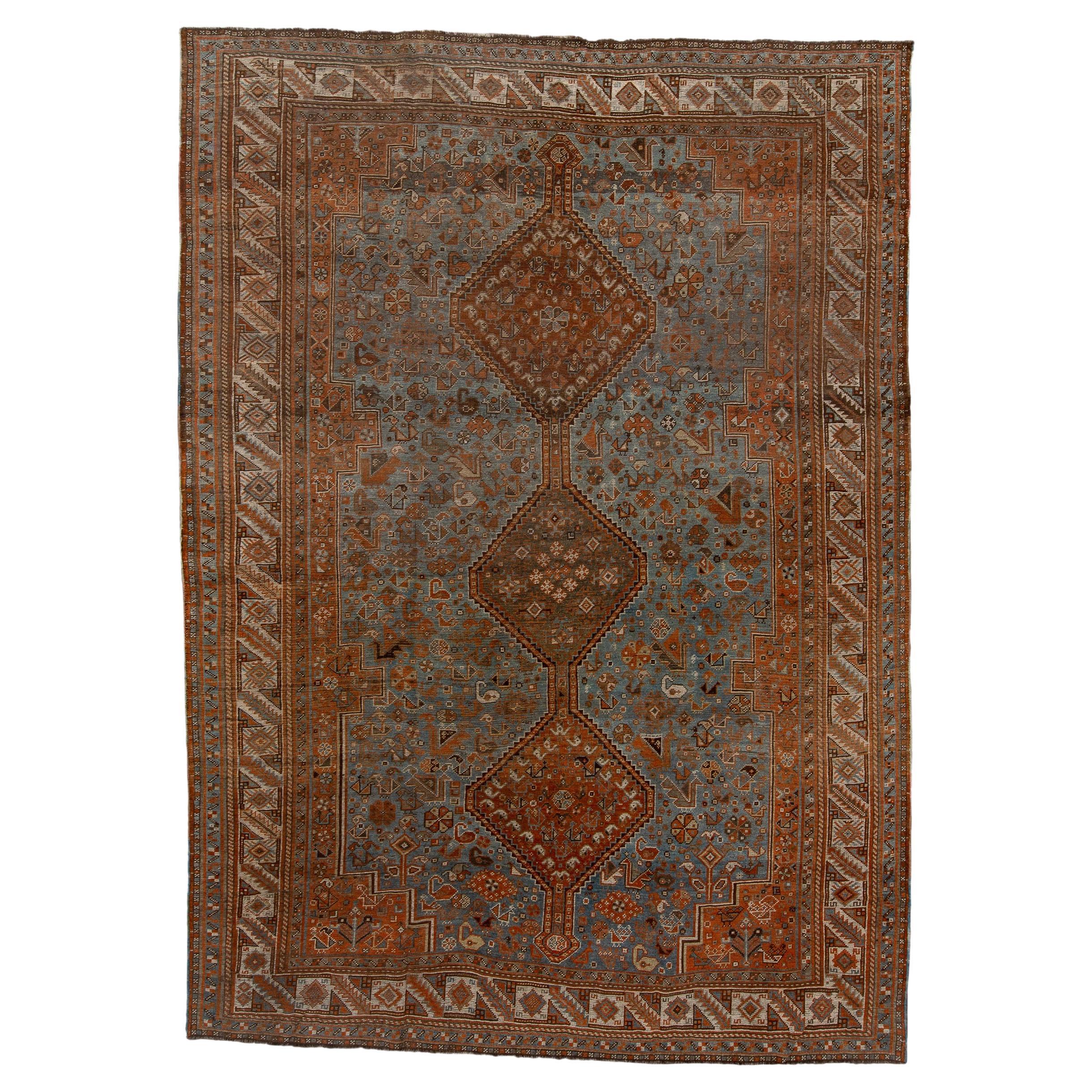 Antique Tribal Shiraz with Light Blue Field and Rosette Border
