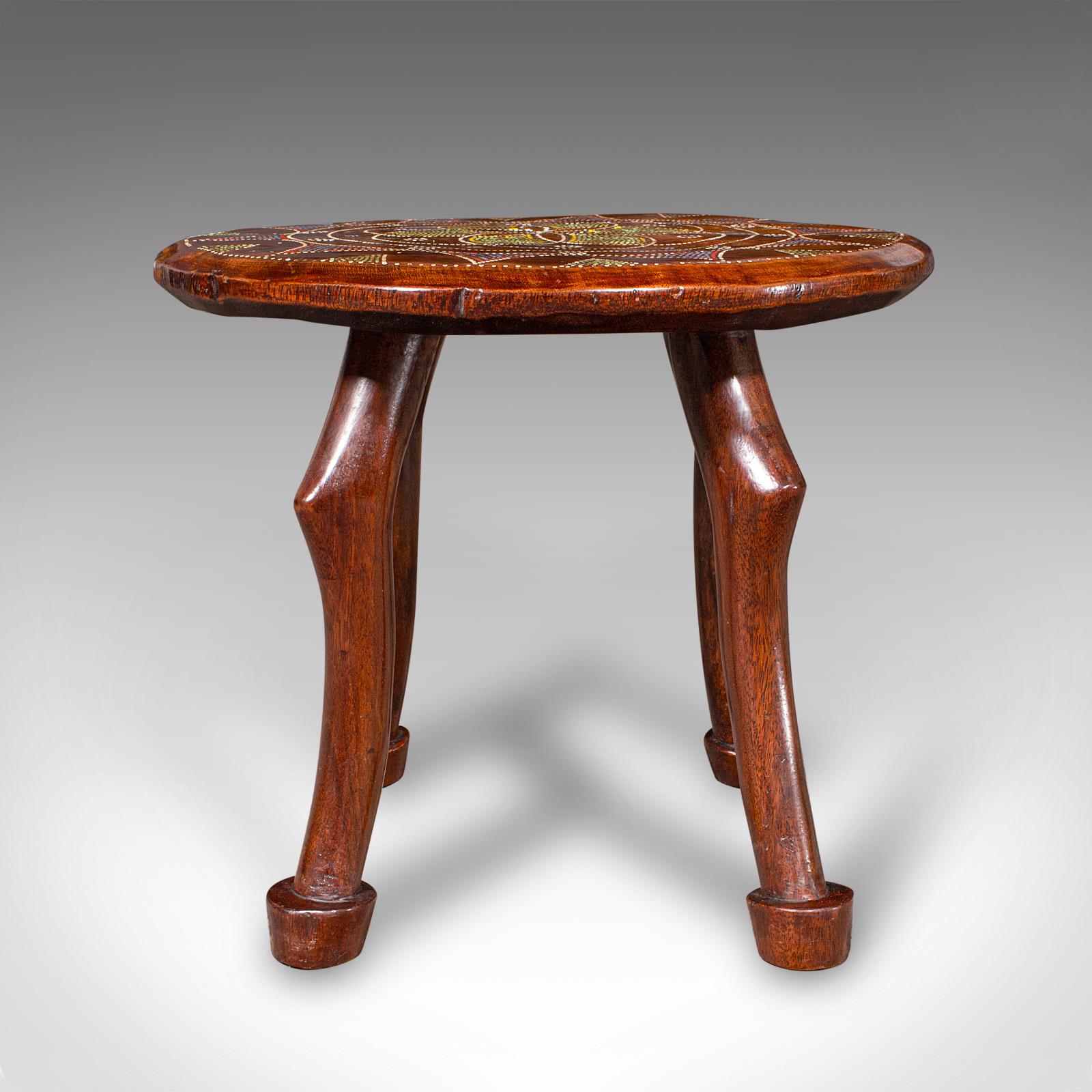 This is an antique tribal side table, an African fruitwood occasional stool or lamp table, dating to the late Victorian period, circa 1900.

Distinctive tribal side table, redolent of Luo craftsmanship from Kenya
Crafted in solid fruitwood, with