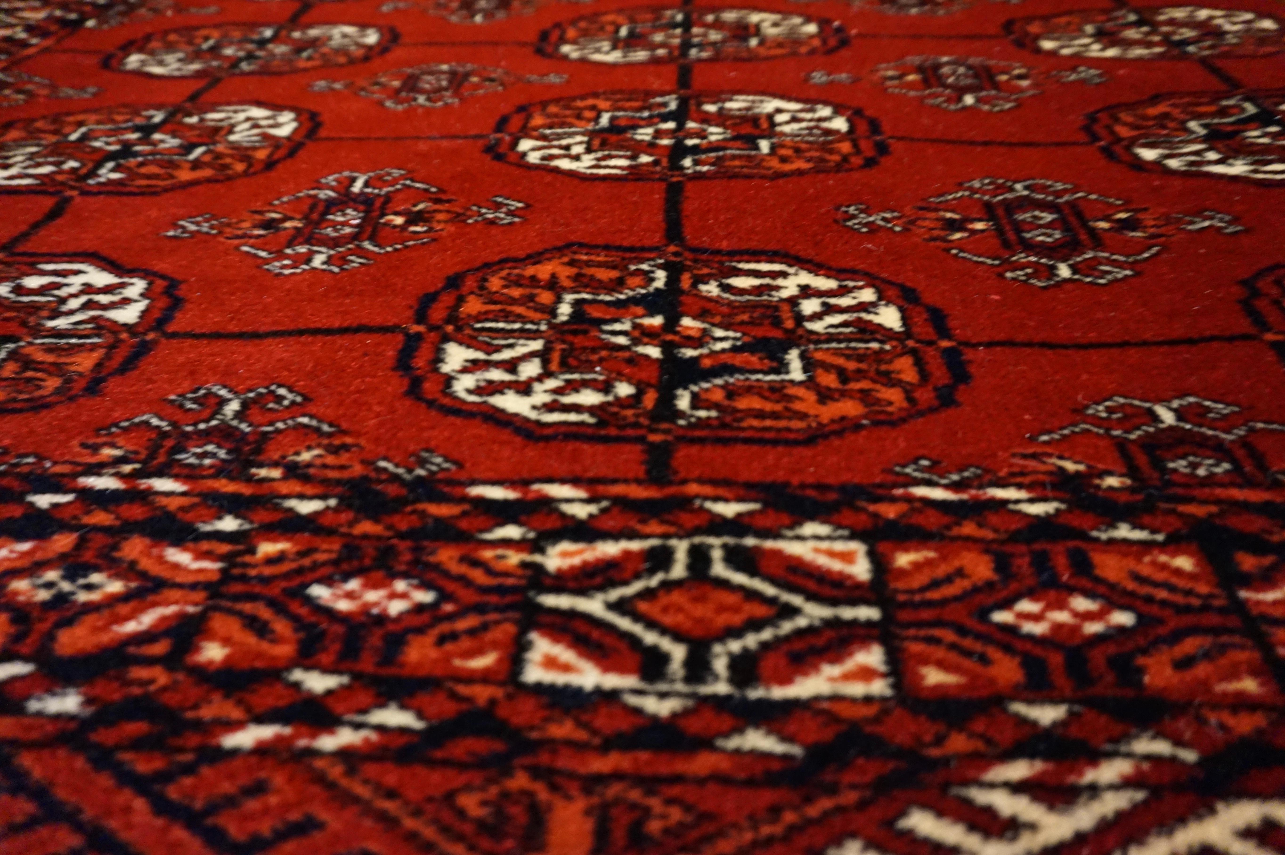 Antique Tribal Turkomen Bokhara Hand Knotted Wool Rug In Good Condition In Vancouver, British Columbia
