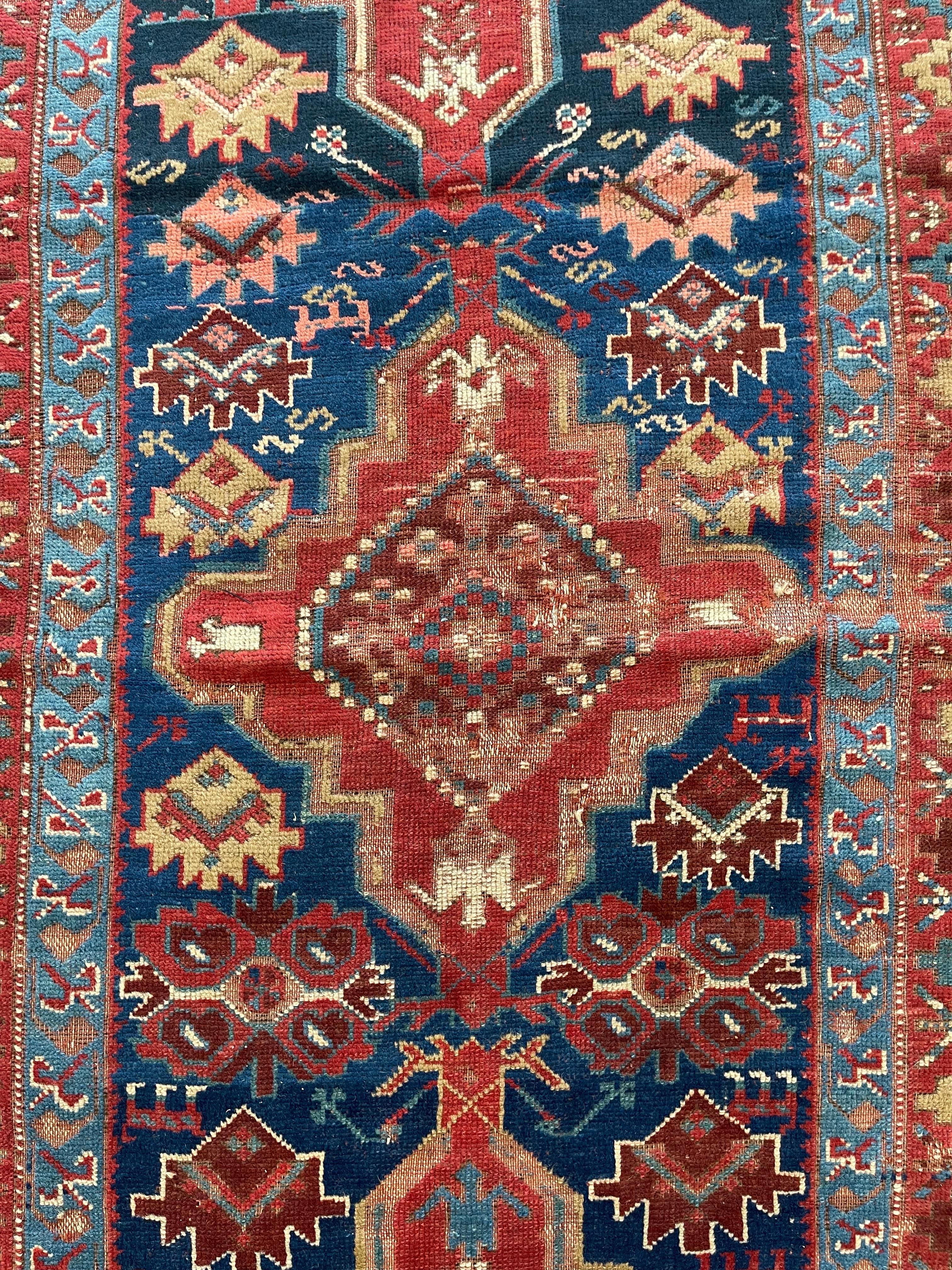 Wool Antique Triple Medallion Caucasian Kazak circa 1900 For Sale