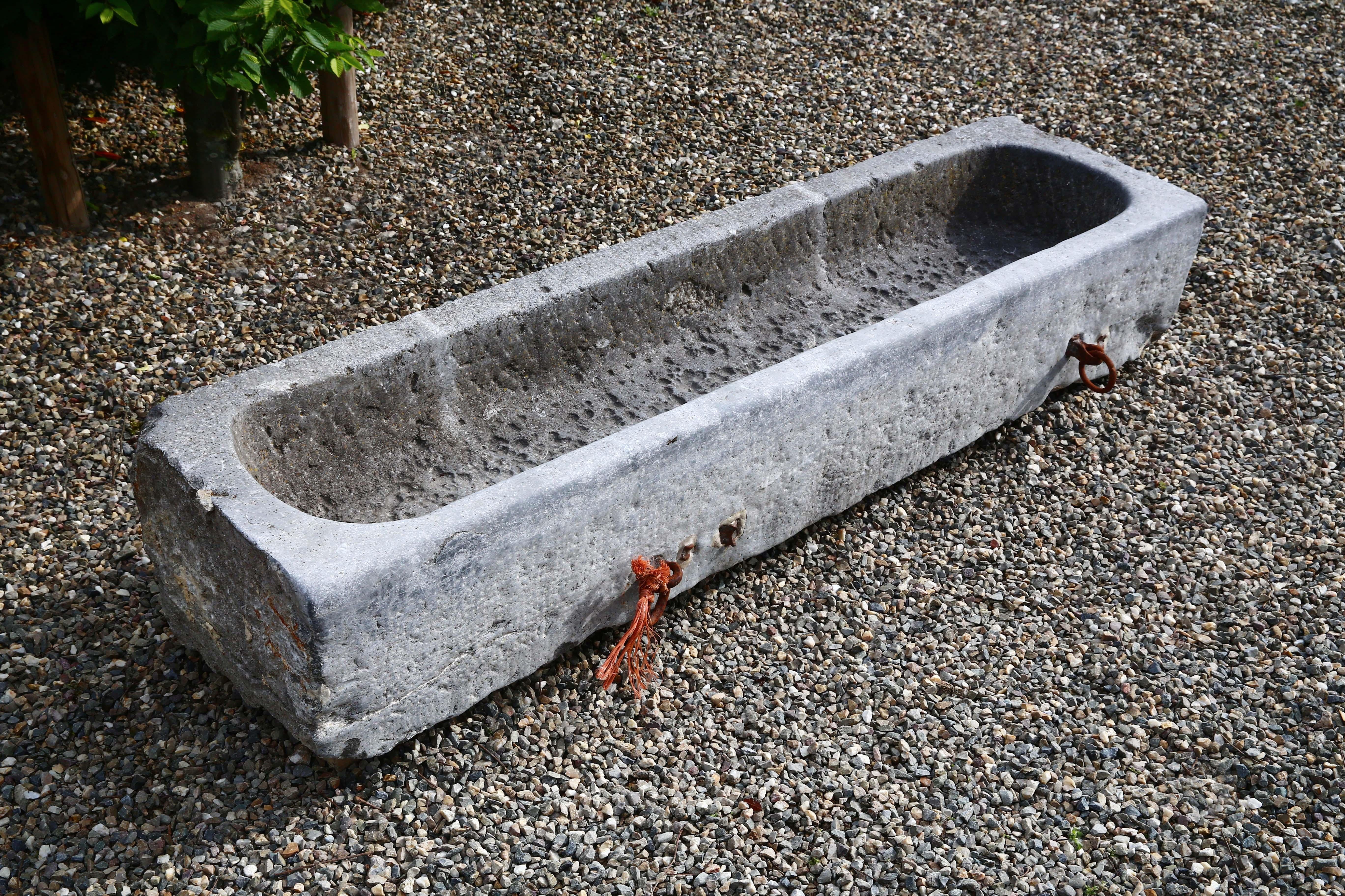 Very nice antique trough of Belgian Bluestone. This old trough is more than 110 years old and gives a wonderful look in a garden or as furniture for the bathroom!