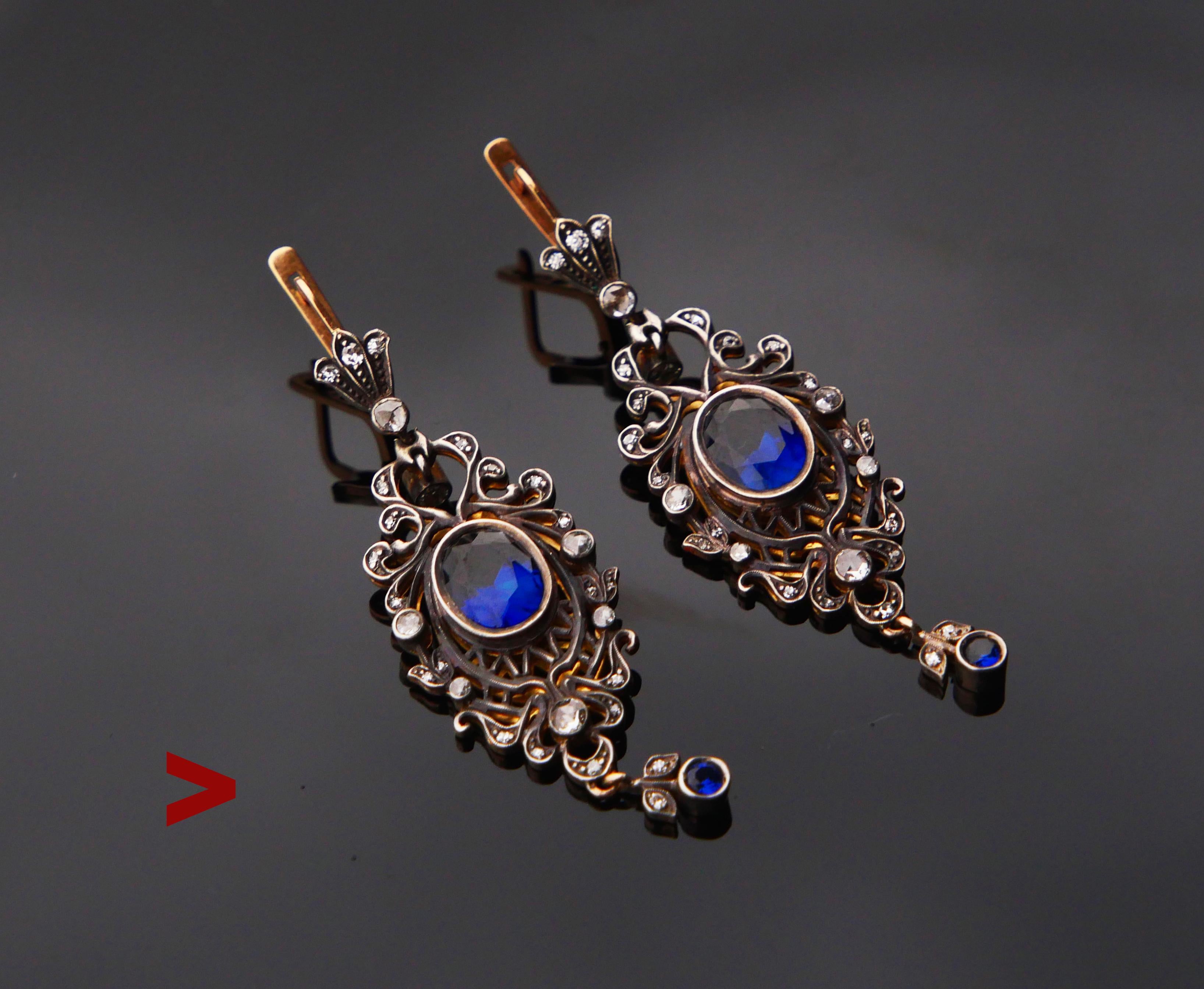 A pair of antique Russian hand-made chandeliers with whimsy openwork dangles of fused solid 14K Gold and Silver, decorated with Blue Sapphires and diamonds. Ca.early XX cent, Russian hallmarks,56, maker's.Very feminine shapes.Very accurate work. Who