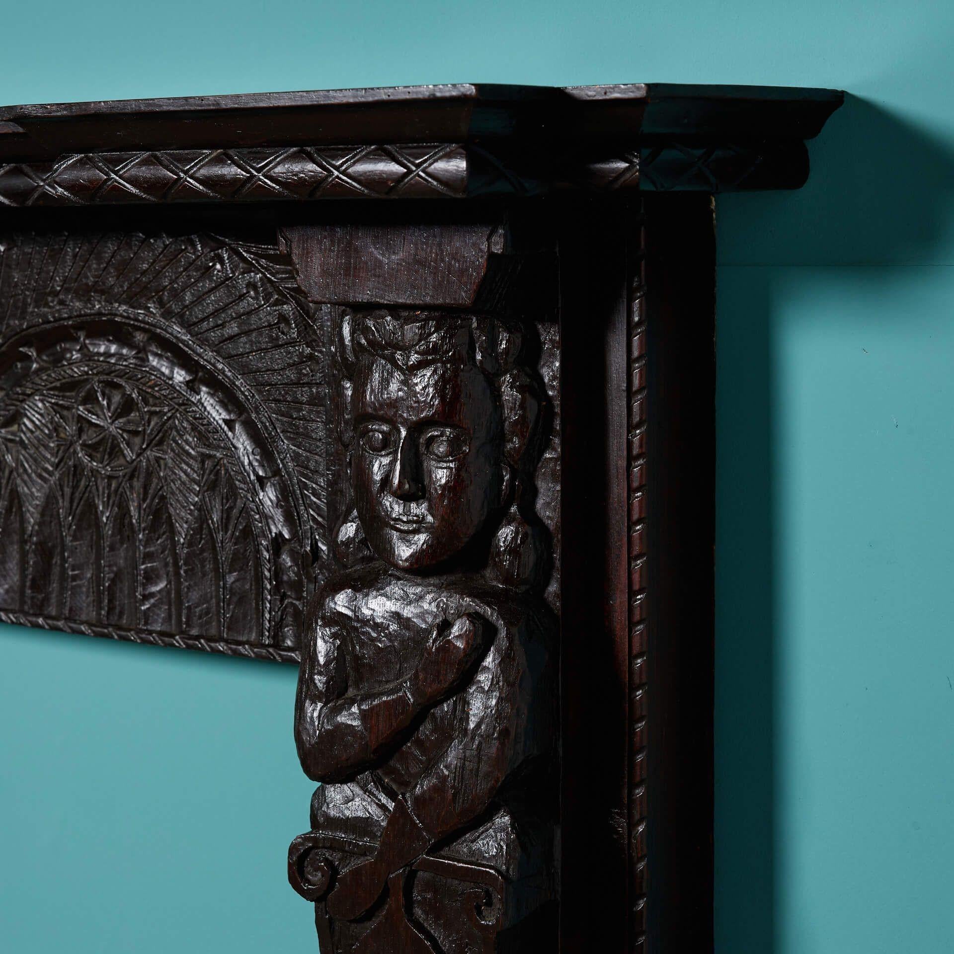 English Antique Tudor Style Carved Oak Fireplace For Sale