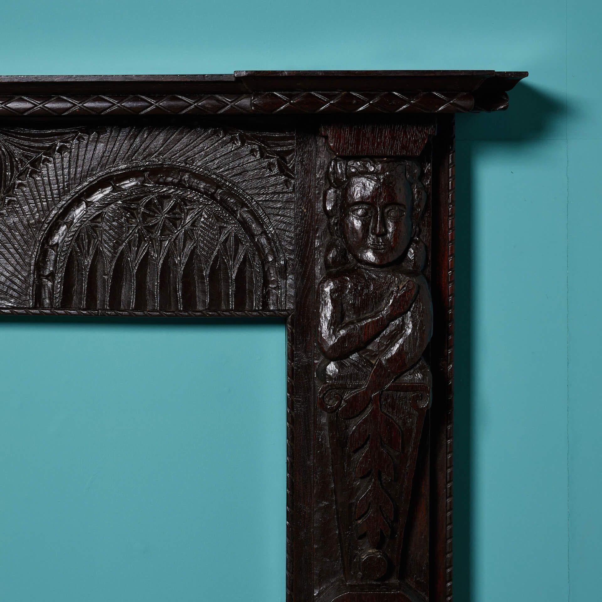 Antique Tudor Style Carved Oak Fireplace In Fair Condition For Sale In Wormelow, Herefordshire