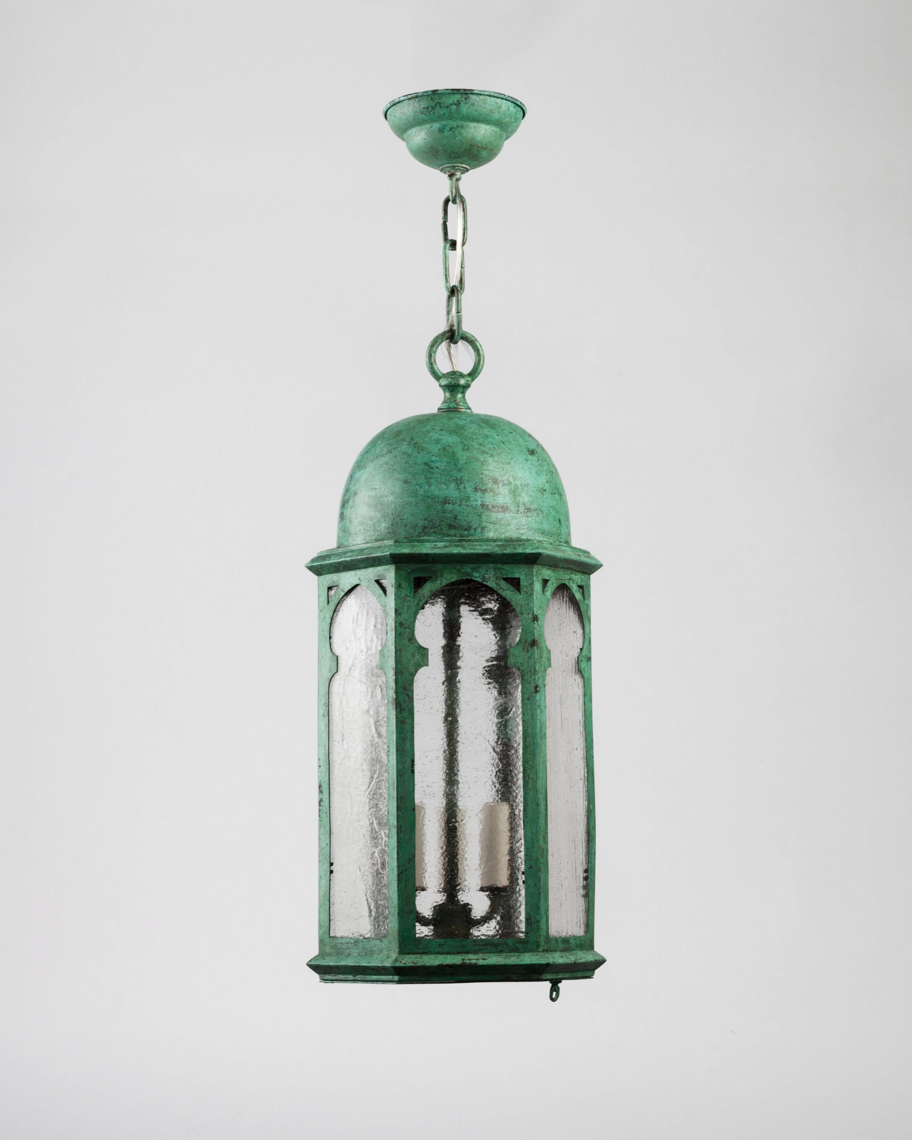 AHL3787

A vintage dome-topped hexagonal verdigris copper lantern glazed with seeded clear glass. With a hinged bottom door for re-lamping. Circa 1930s.

Dimensions:
Current height: 63-3/8