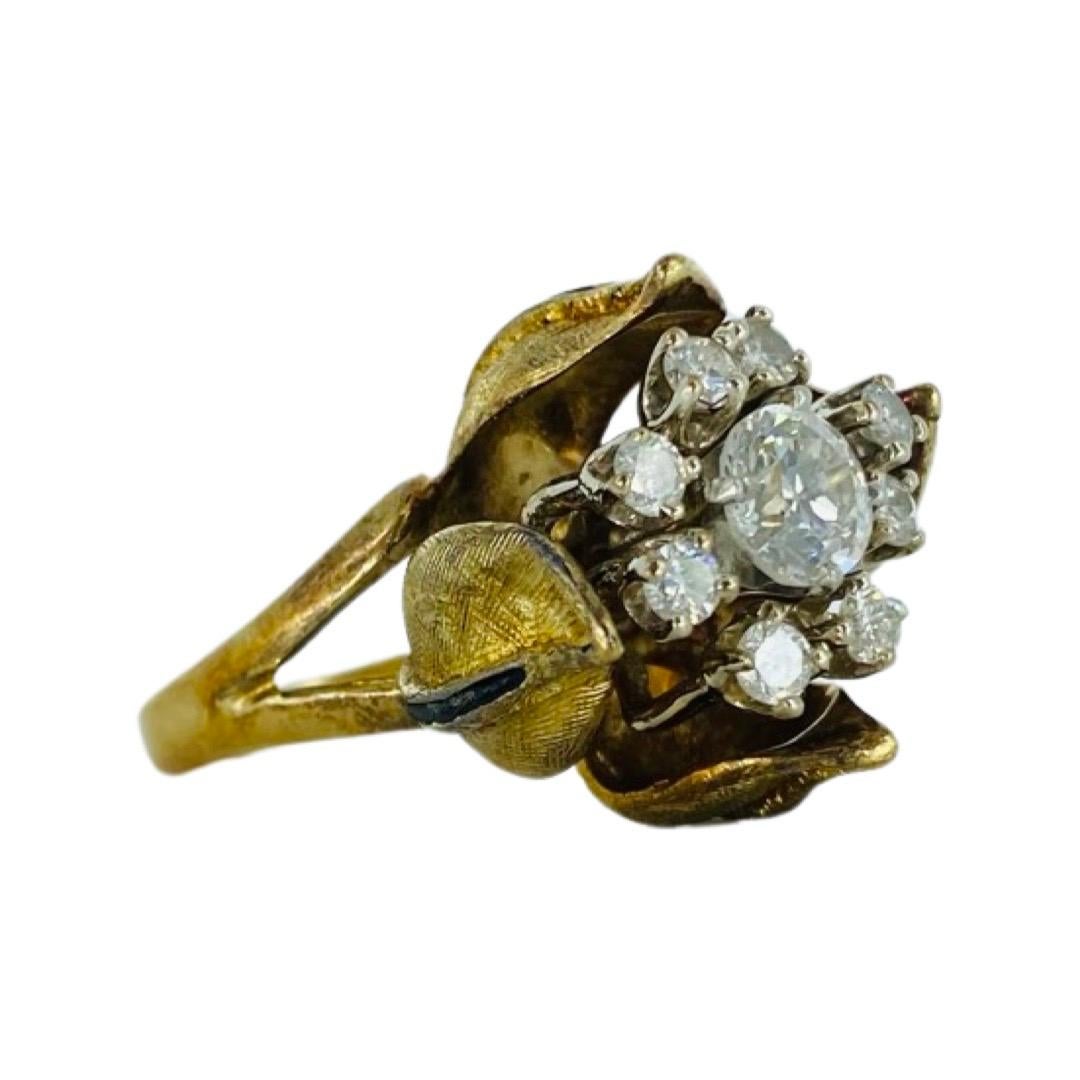 Antique Tulip Enamel 1.18 Total Carat Weight Diamonds Cluster Ring 14k Gold
The ring features natural old mine diamonds approx G/H color &  VS/SI clarity. The center diamond weights approx 0.70 carat by formula and surrounded by 8 round diamonds