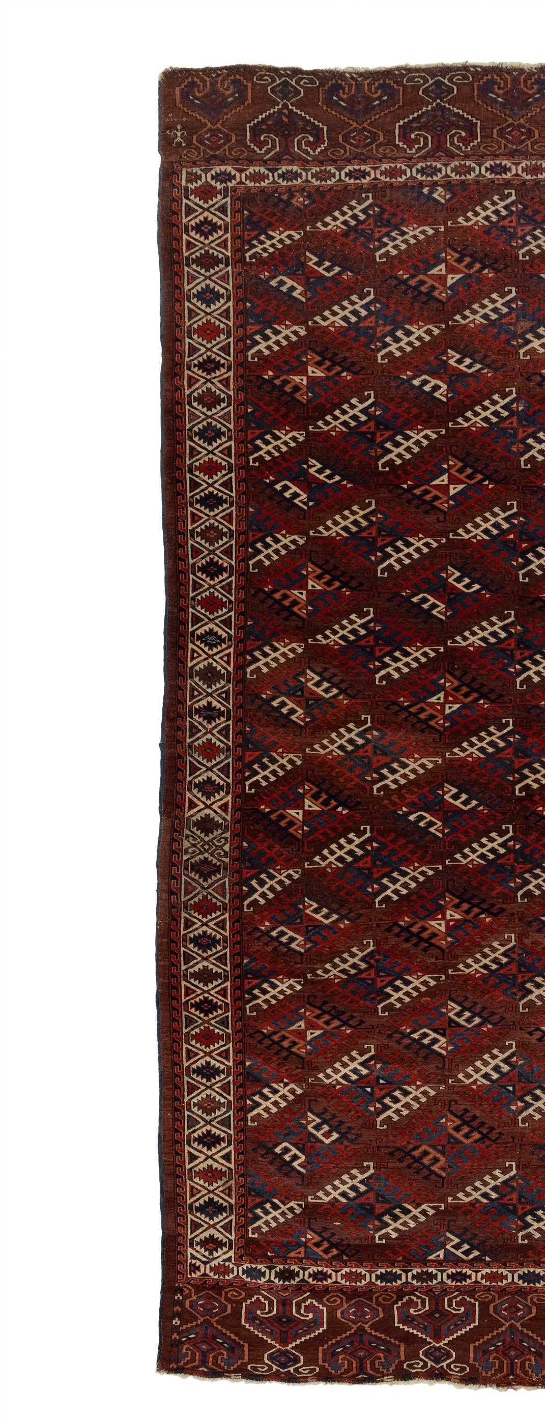 This exquisite antique Turkaman rug is truly a sight to behold. Expertly crafted in the 1850s, it boasts a number of distinctive element panels that are sure to catch the eye of any discerning collector. The strikingly rich red and brown background