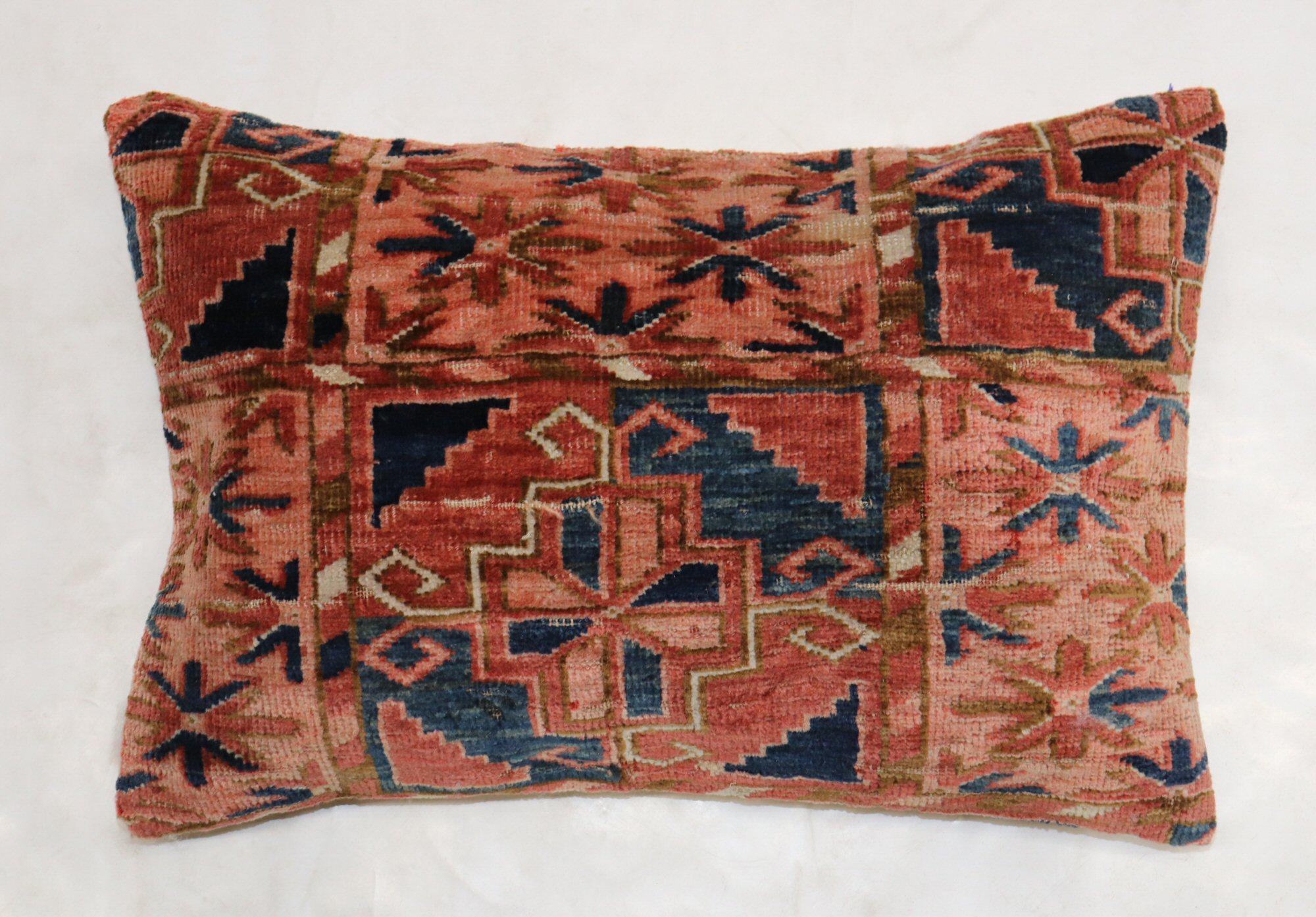 Pillow made from a 19th-century Turkeman rug in a lumbar size.

Measures: 16