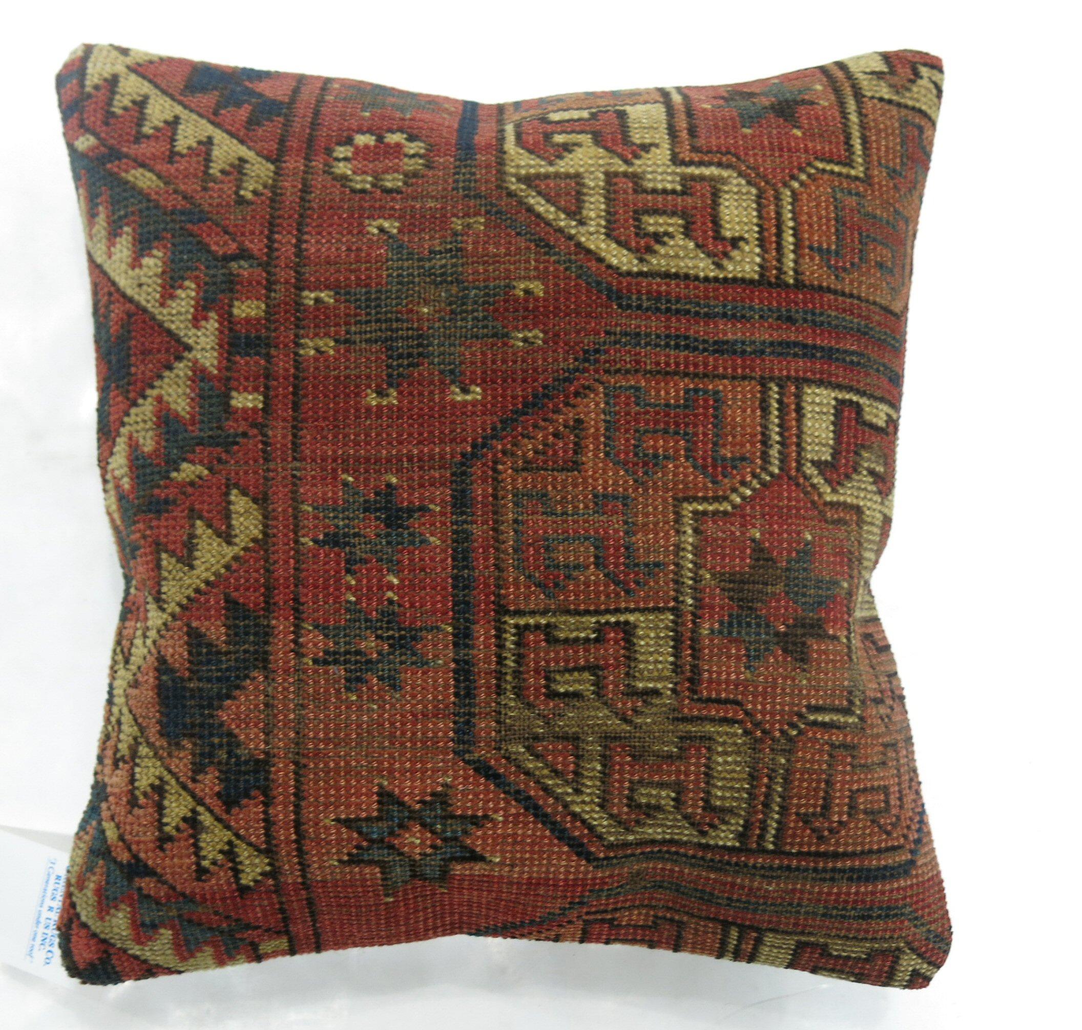 Pillow made from a 19th-century  Turkeman rug.

15'' x 15''.