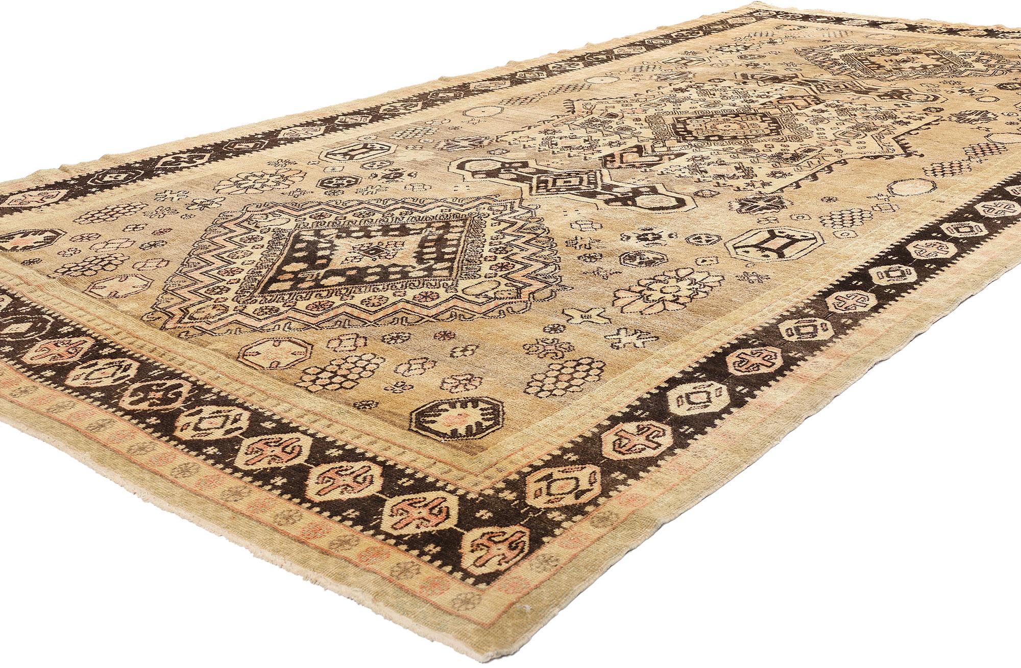 73806 Antique Earth-Tone Turkestan Khotan Rug, 06'09 x 13'02. This hand-knotted wool Turkestan Khotan gallery rug is a striking fusion of ancient tradition and subtle beauty, crafted with skill and reverence for the region's deep cultural heritage.
