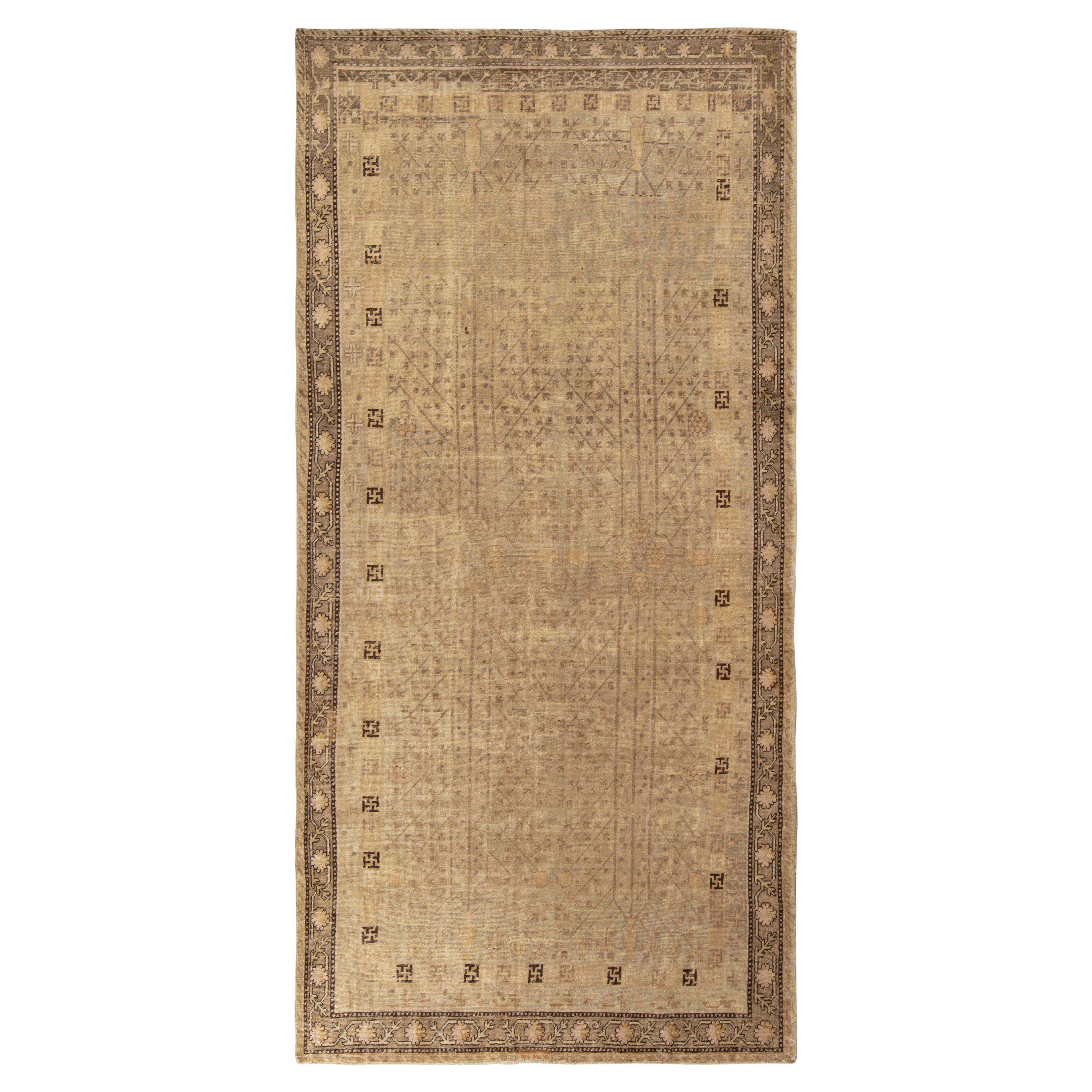 Antique Khotan Runner in an All over Brown Geometric Pattern by Rug & Kilim For Sale
