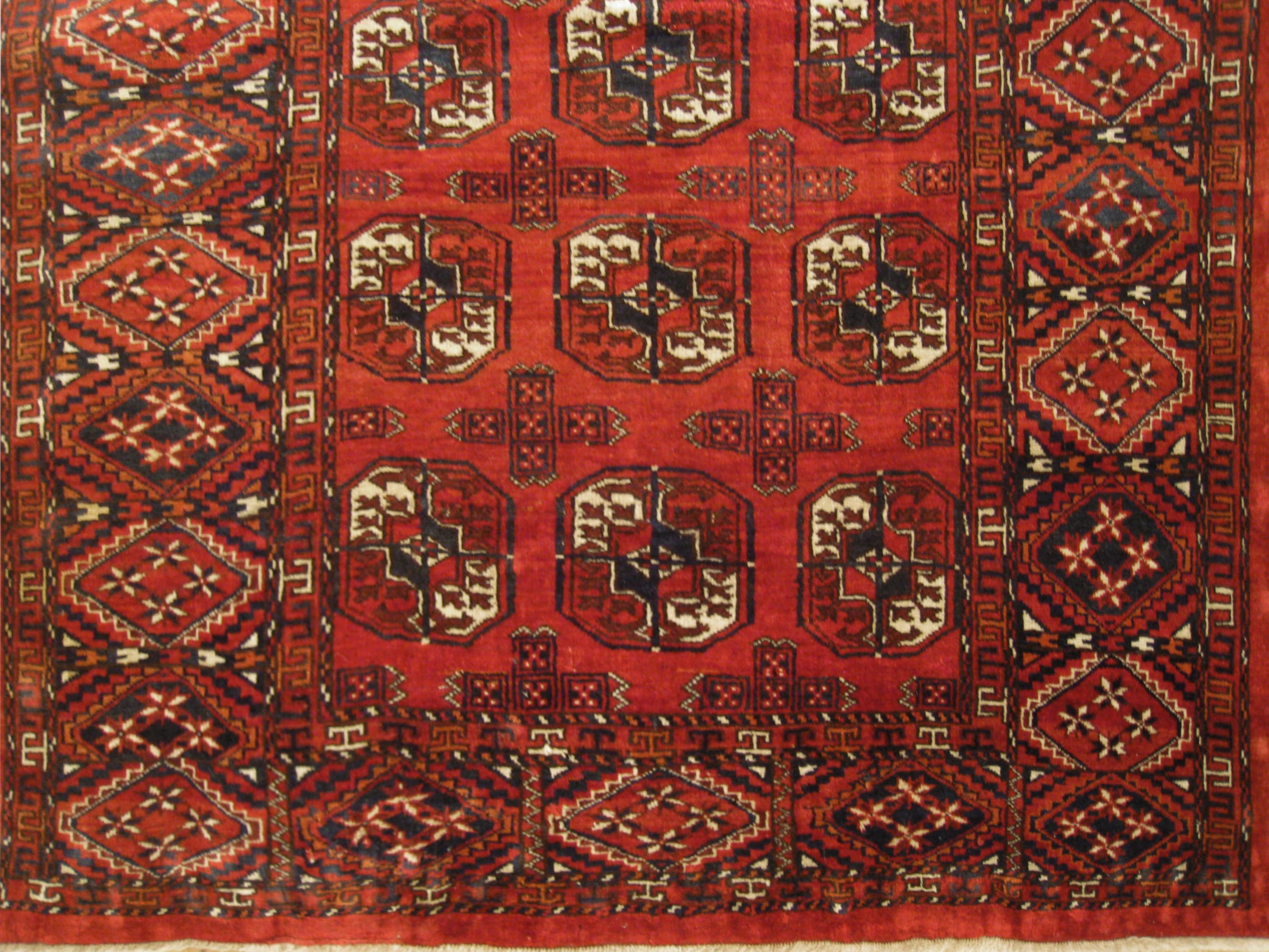 Hand-Knotted Antique Turkestan Turkman Rug, in Small Size, with Repeating Design For Sale