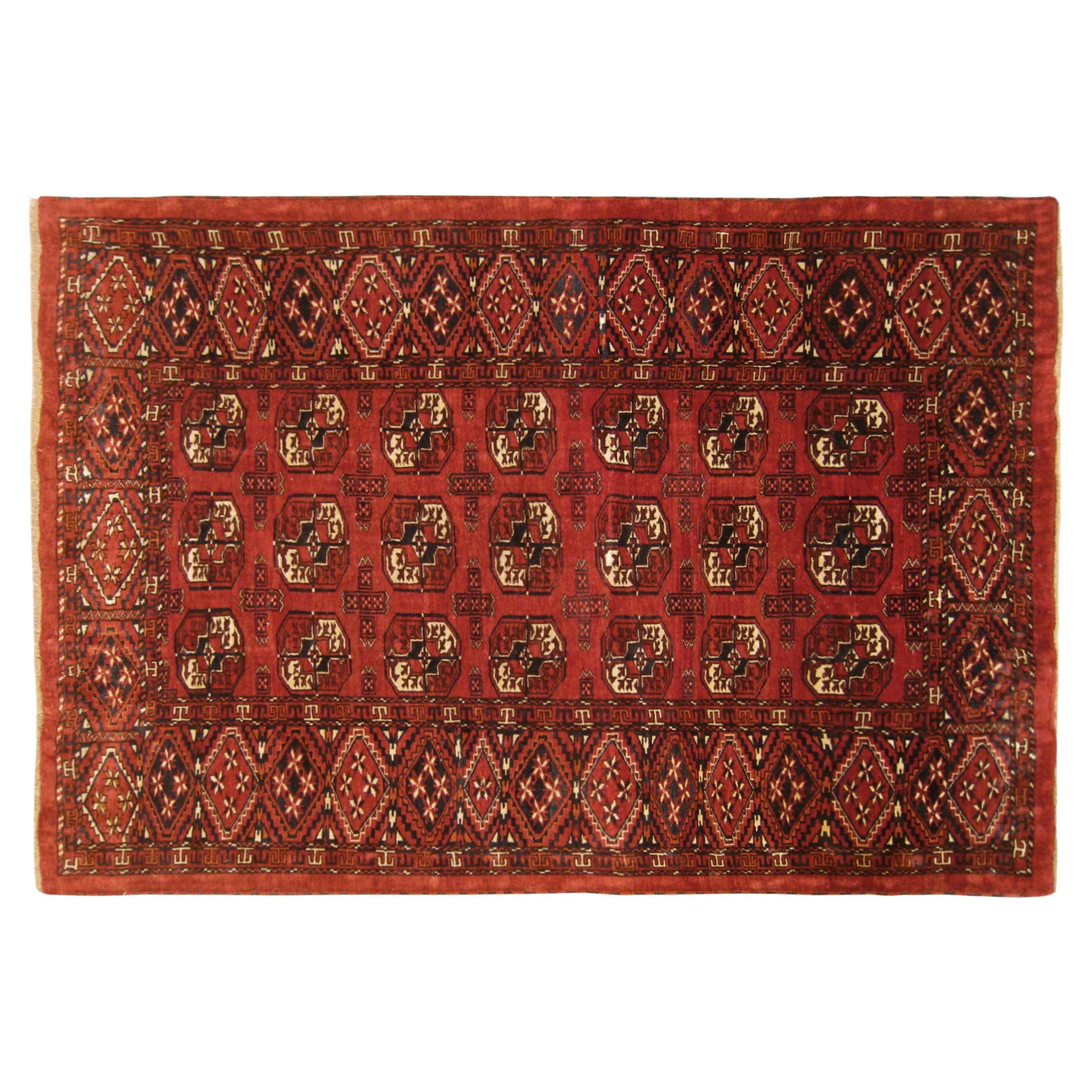 Tapis turc ancien du Turkestan, de petite taille, avec motif répétitif