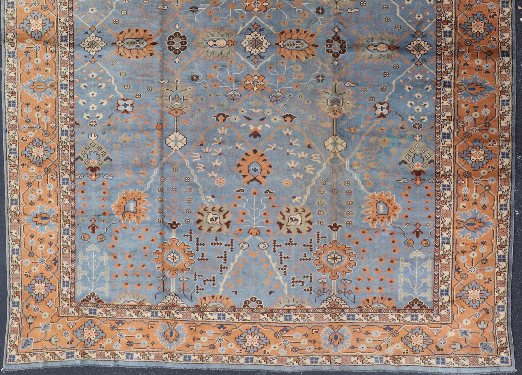 Antique Turkish All Over Oushak Rug in Blue Background by Keivan Woven Arts In Excellent Condition For Sale In Atlanta, GA