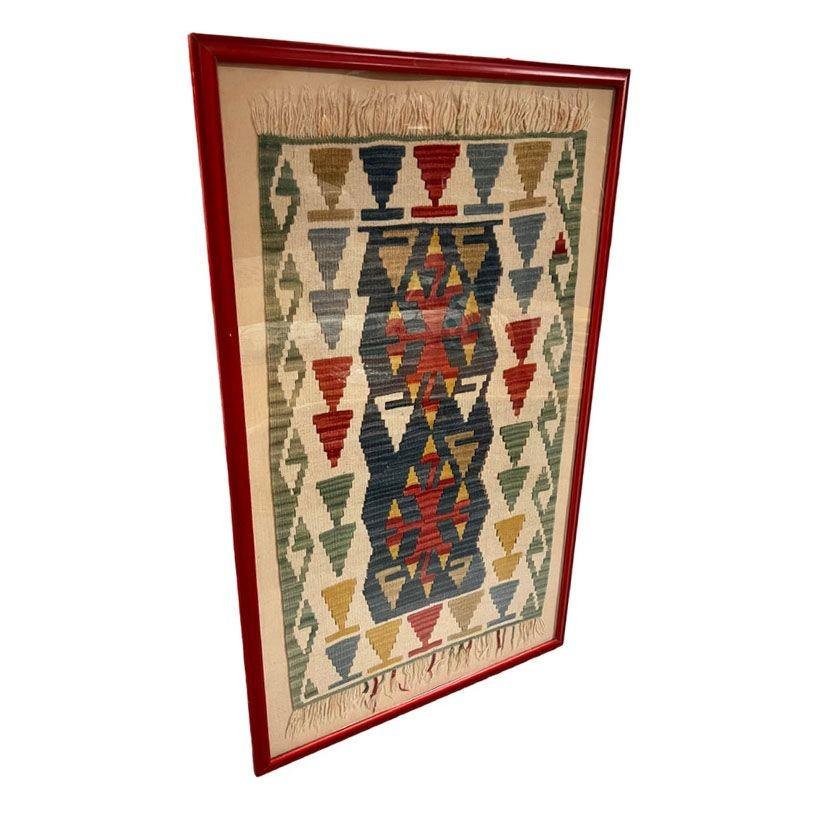 Discover timeless elegance with this framed vintage Turkish Anatolian Killim Rug. Crafted from natural wool, its intricate geometric patterns, and vibrant colors add a touch of history and sophistication to any space. Perfect for collectors and
