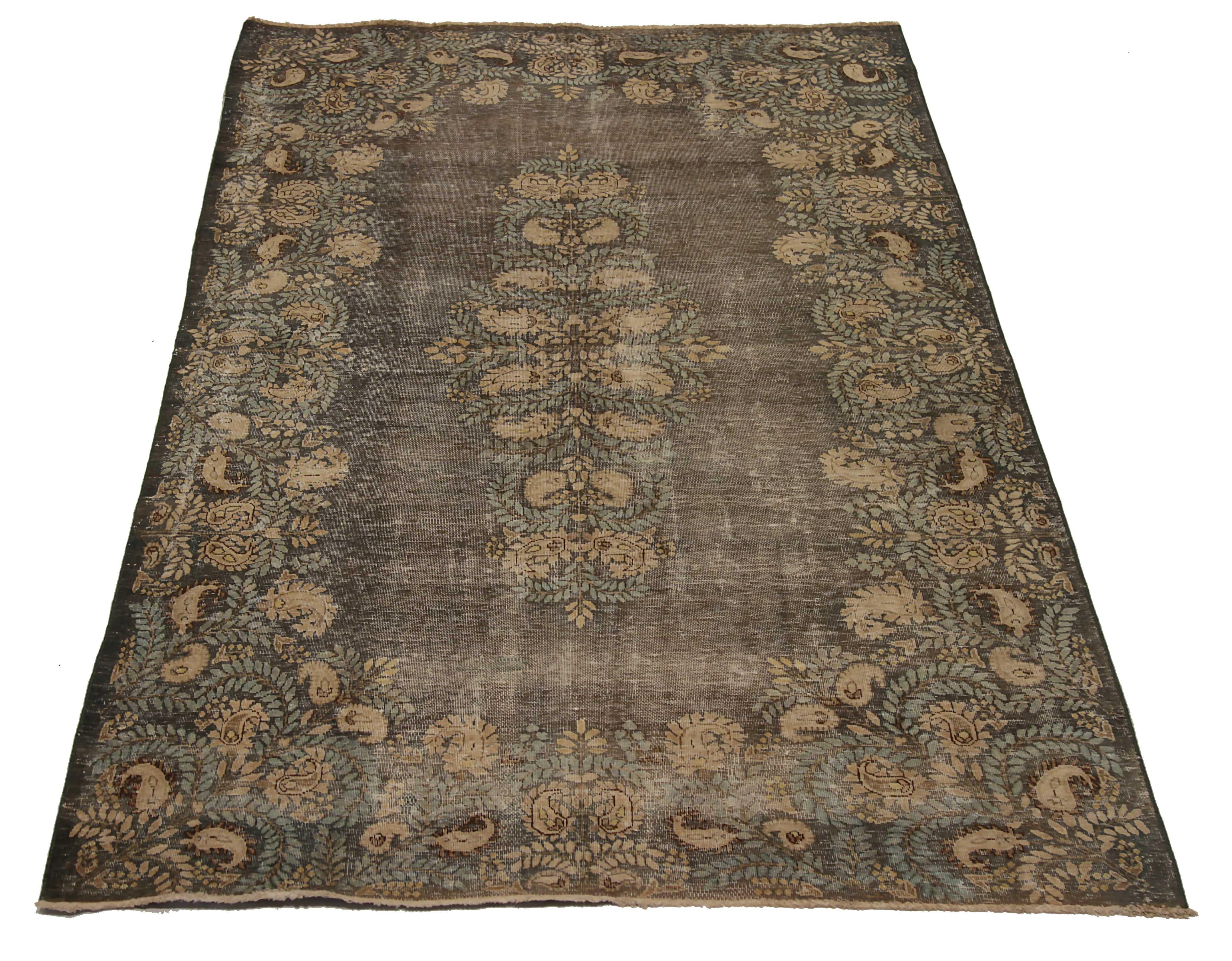 Antique Turkish area rug handwoven from the finest sheep’s wool. It’s colored with all-natural vegetable dyes that are safe for humans and pets. It’s a traditional Kerman design handwoven by expert artisans. It’s a lovely area rug that can be
