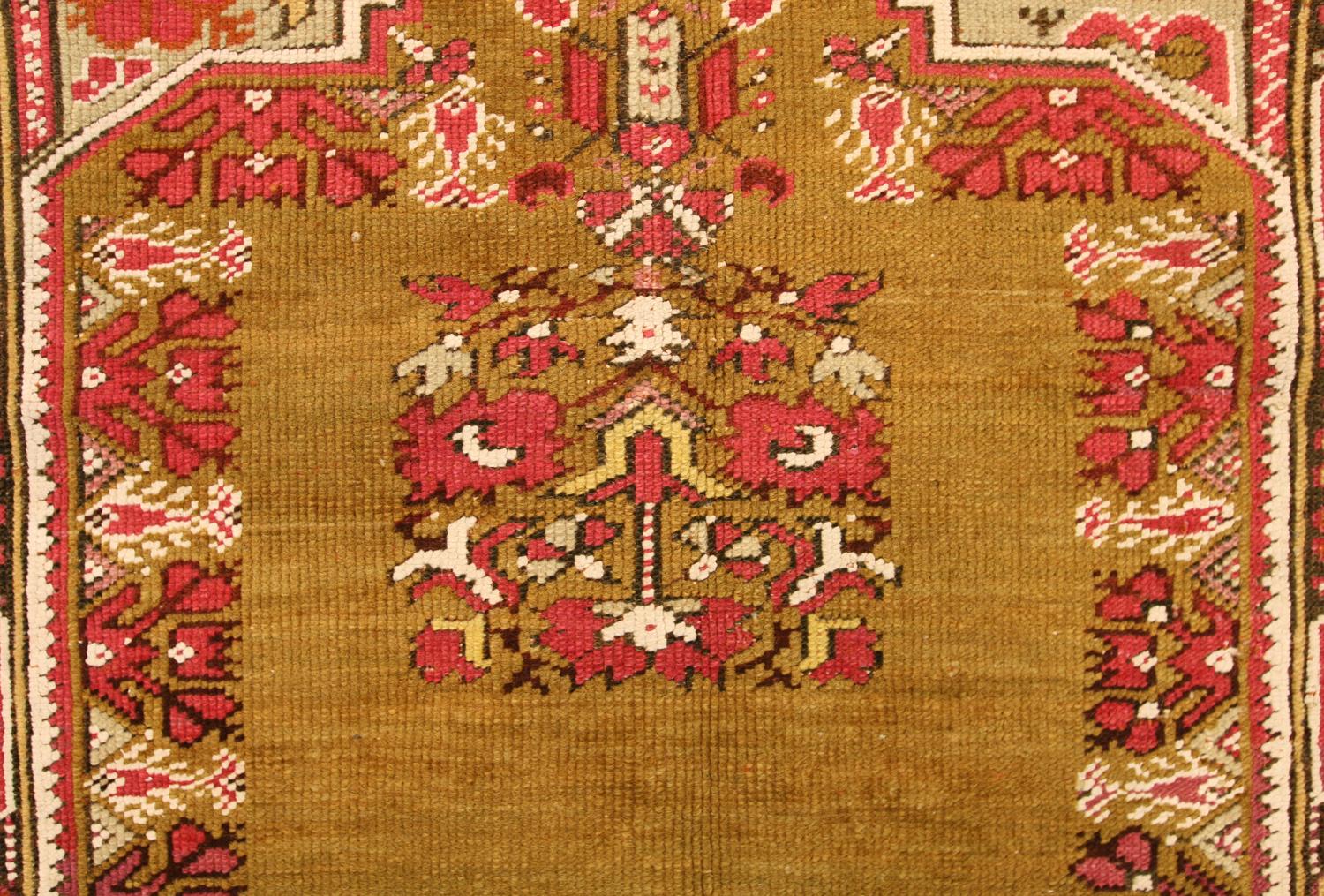 A luxurious and attractive Ghiordes carpet with fantastic Stylized Motif design. The prominent features of Ghiordes carpets (also spelled Giordes) are the angular prayer niches, highly decorative spandrels, architectural columns and beautiful