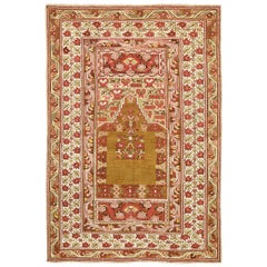 Antiker türkischer Ghiordes-Teppich aus Wolle in Beige und Rot, 1880-1900